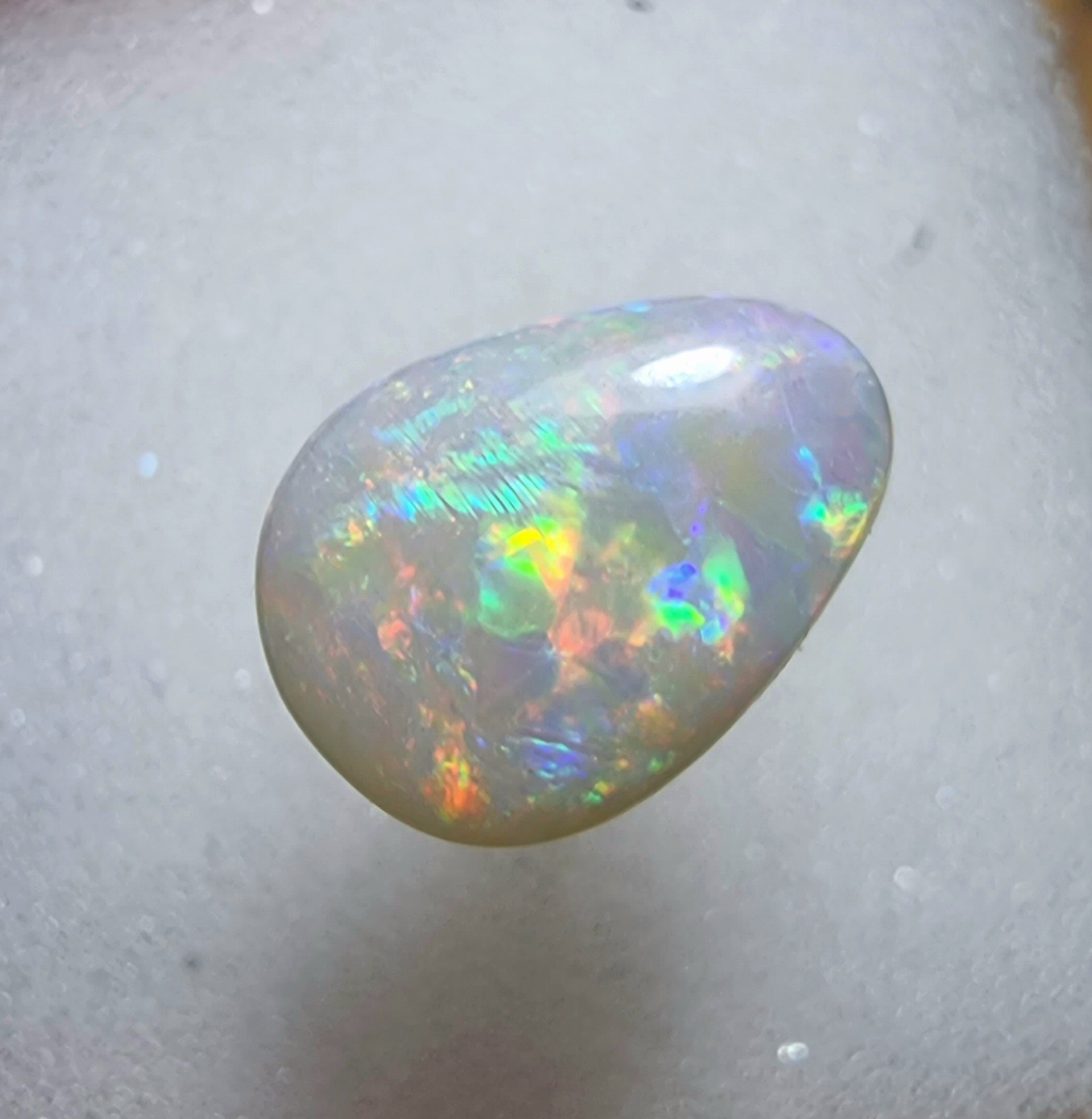 A167 - Drop cut flawless white opal