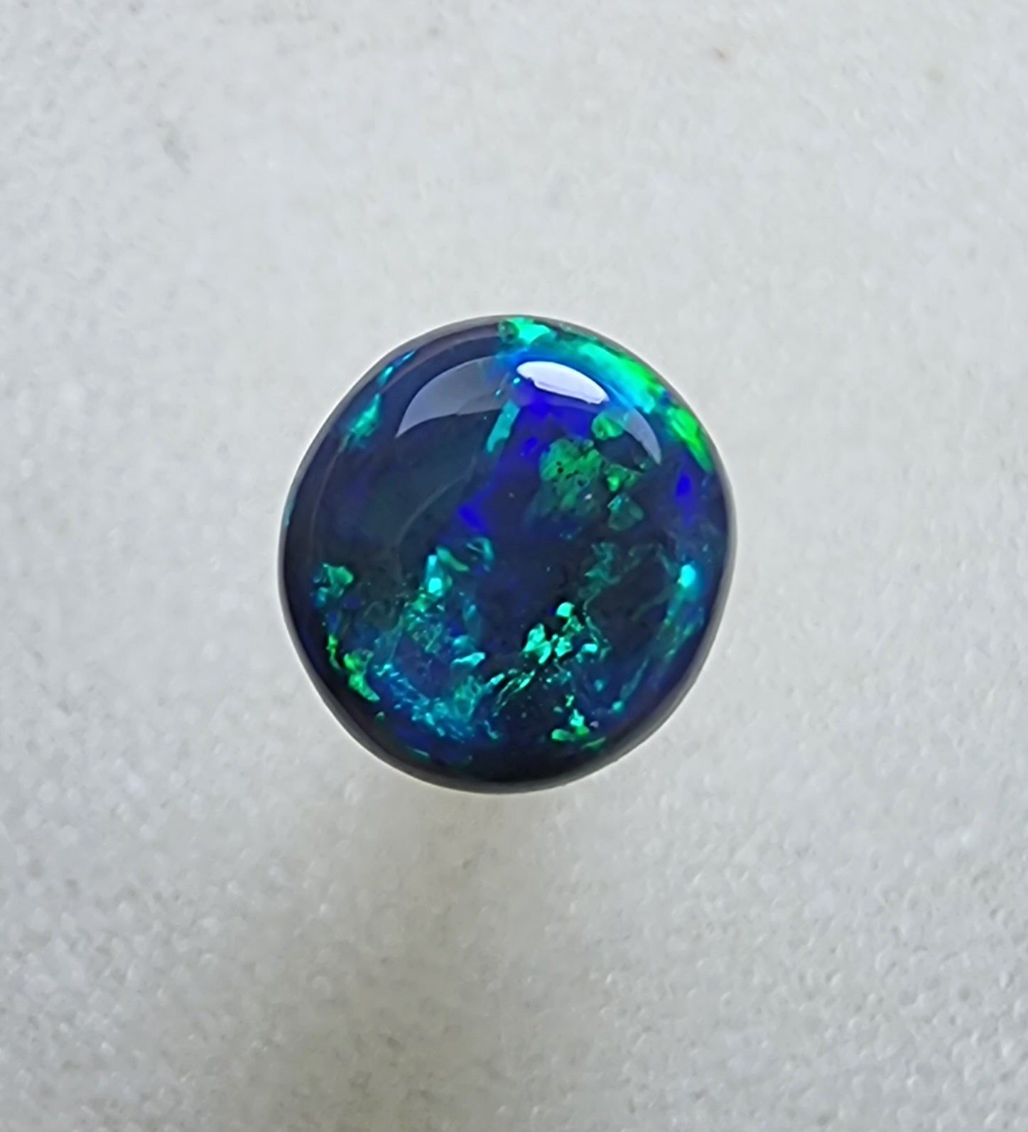 A431 - Stunning circle cut black opal