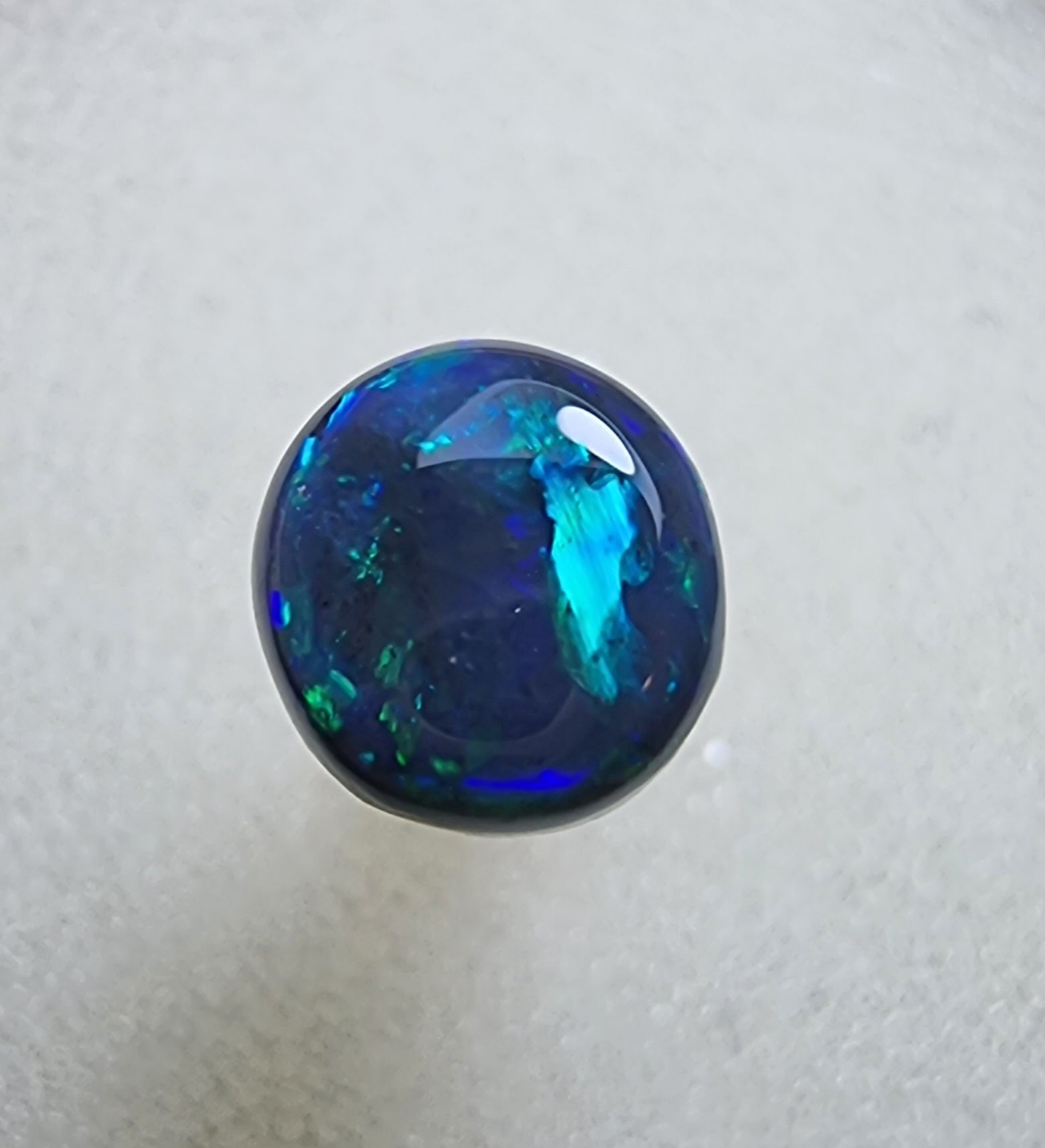 A431 - Stunning circle cut black opal