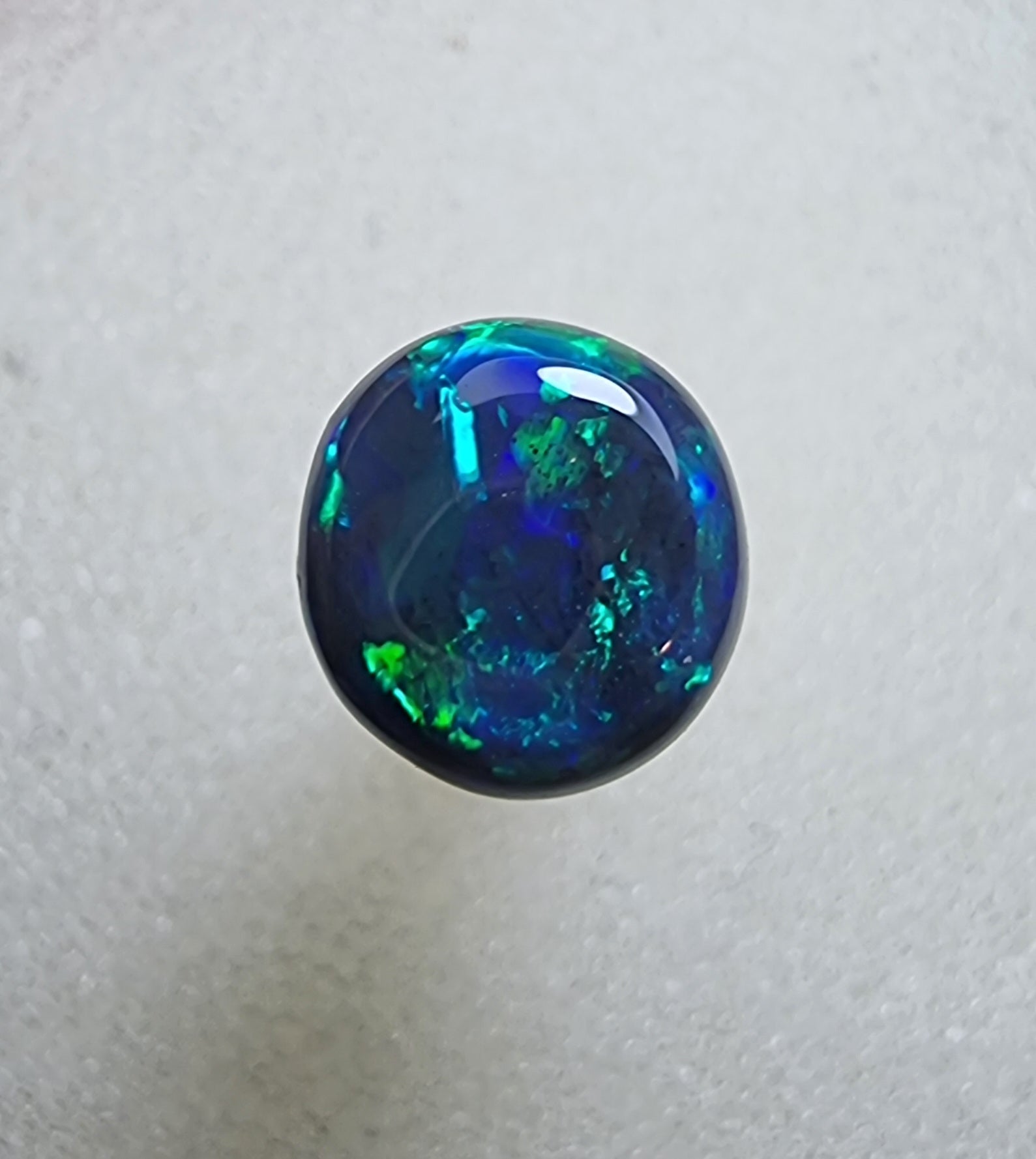 A431 - Stunning circle cut black opal