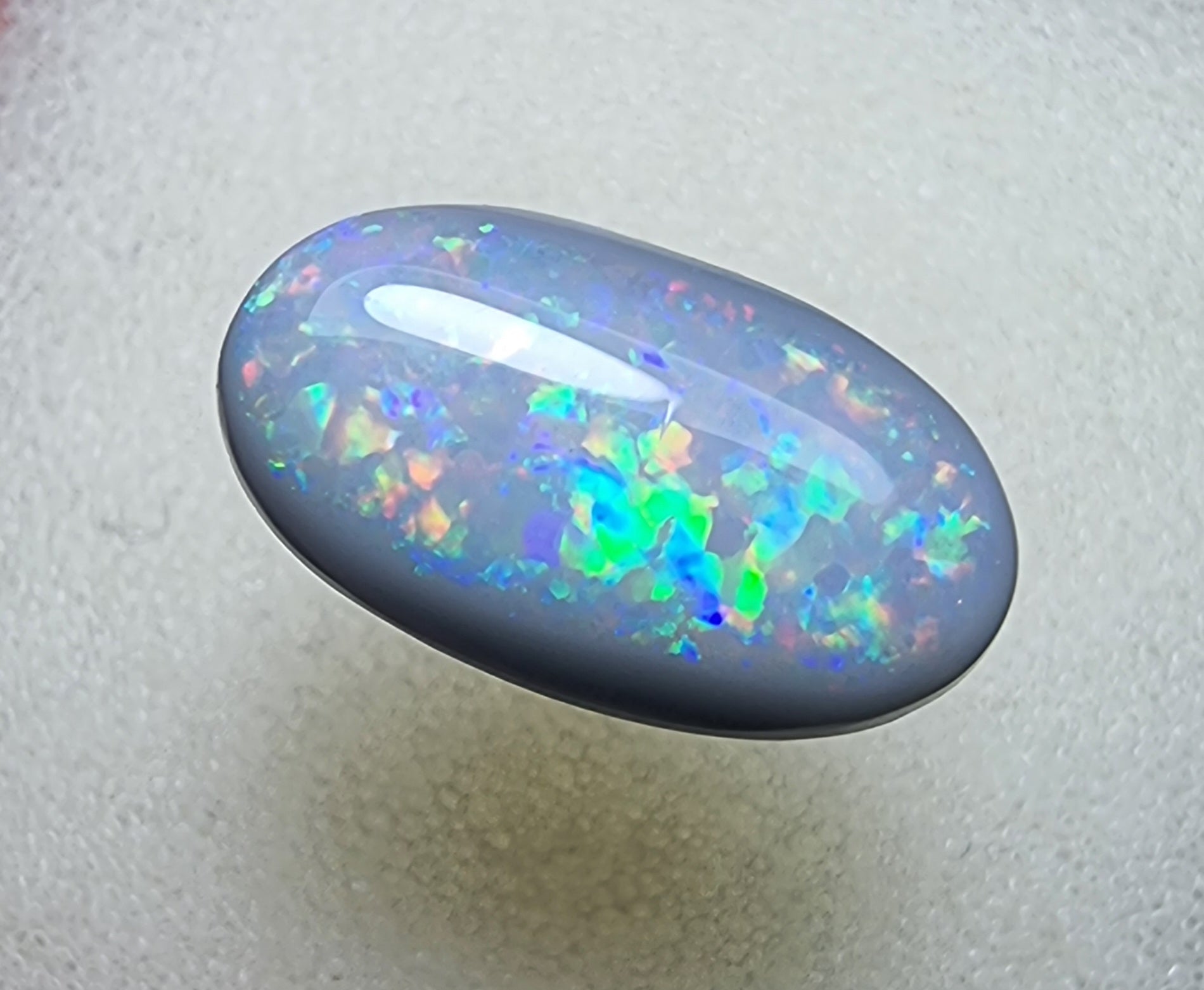 A456 - Flagstone dark opal oval cut