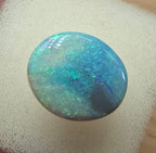 A606 - Large broad faced dark opal