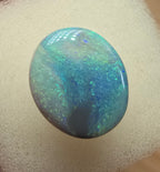 A606 - Large broad faced dark opal