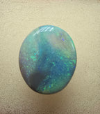 A606 - Large broad faced dark opal