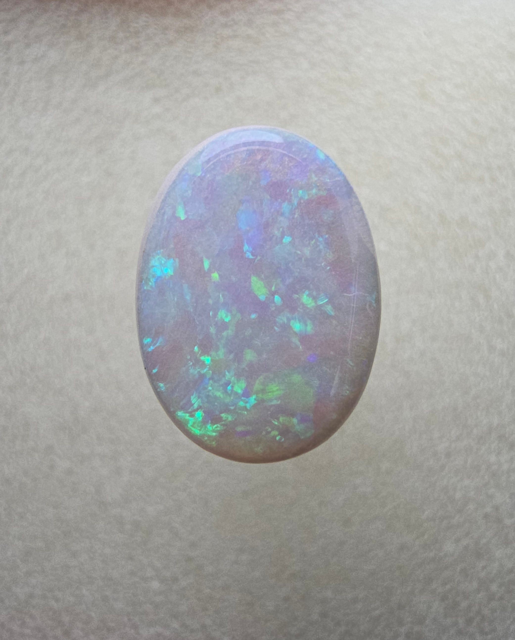 A111 - Oval cut white opal