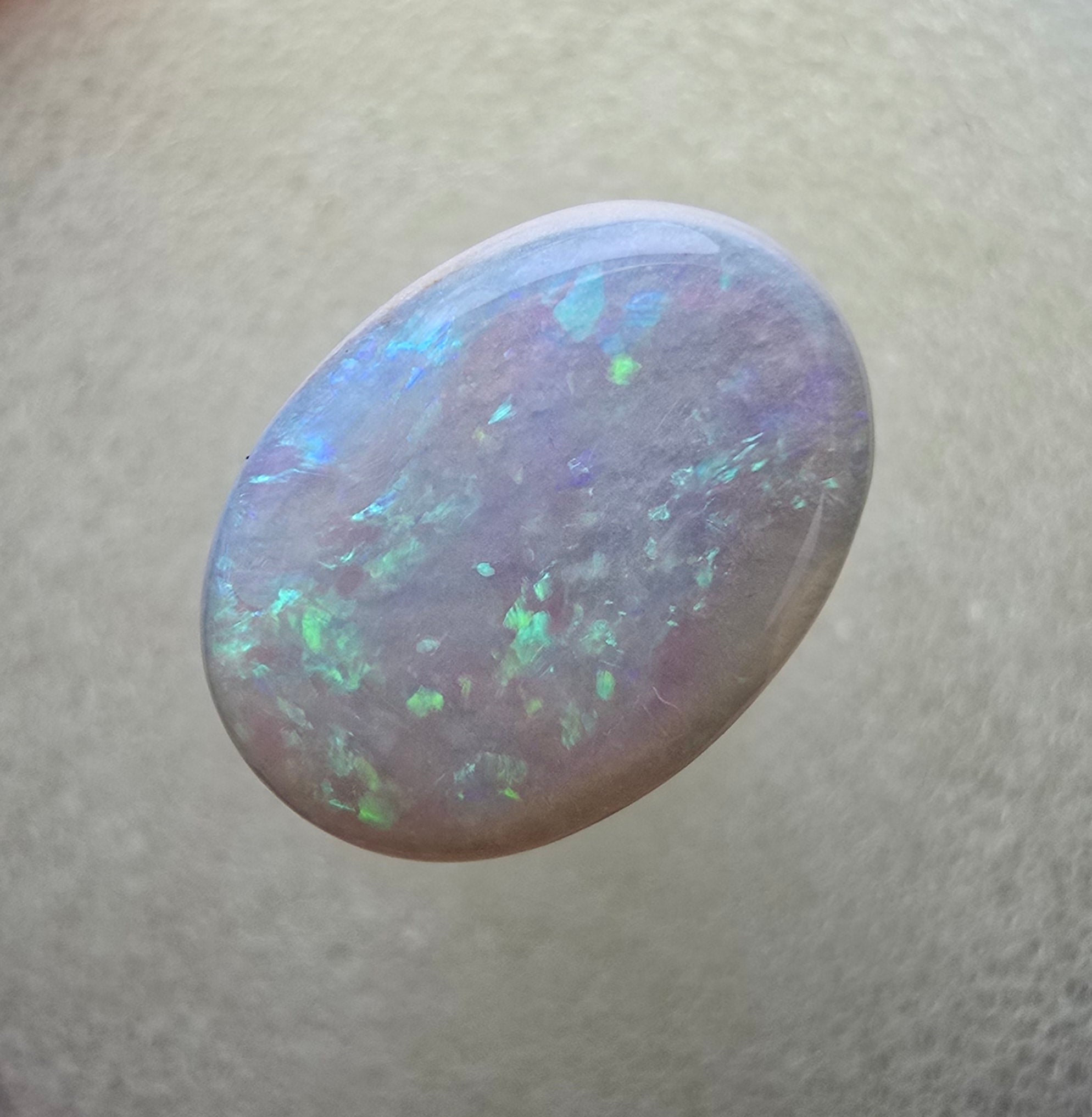 A111 - Oval cut white opal