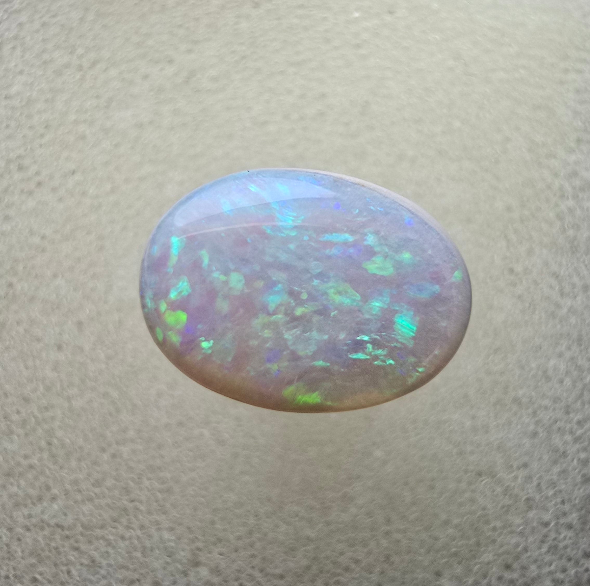 A111 - Oval cut white opal