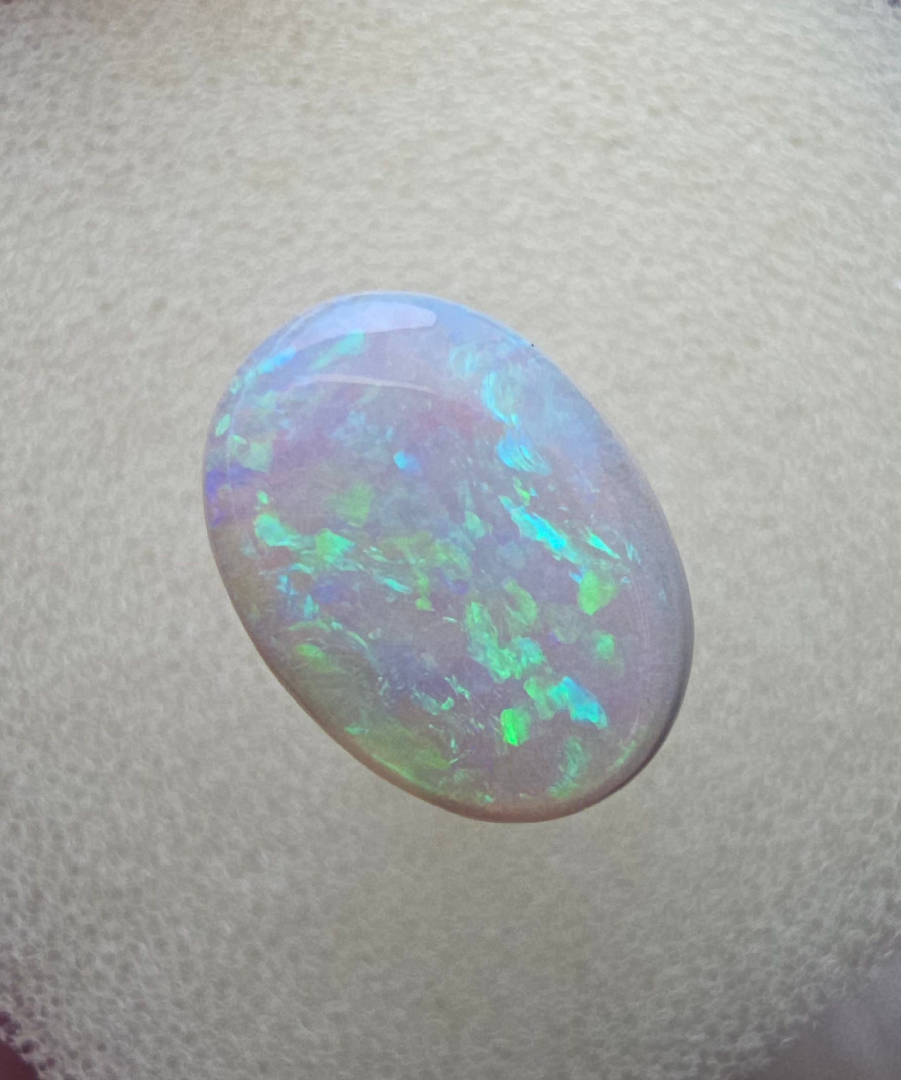 A111 - Oval cut white opal