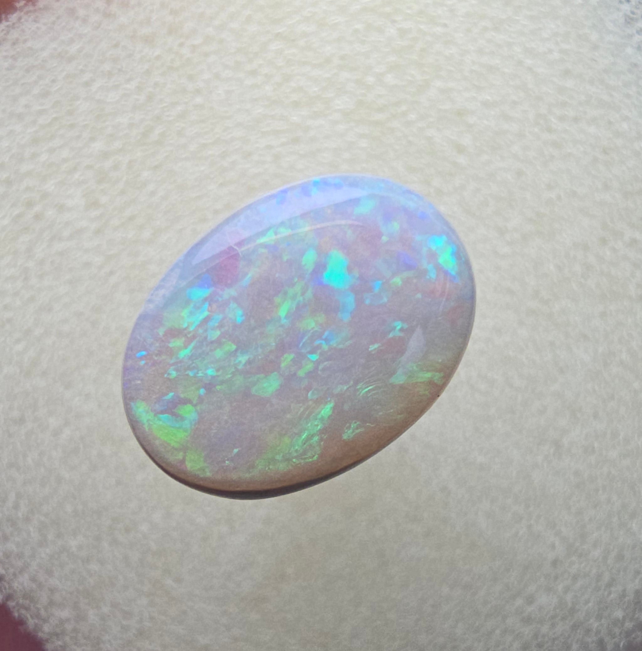 A111 - Oval cut white opal
