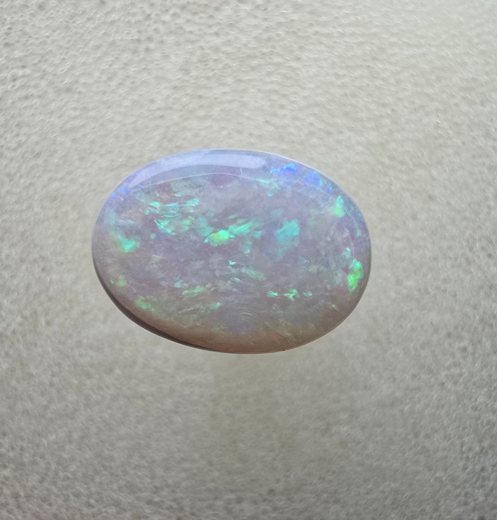 A111 - Oval cut white opal