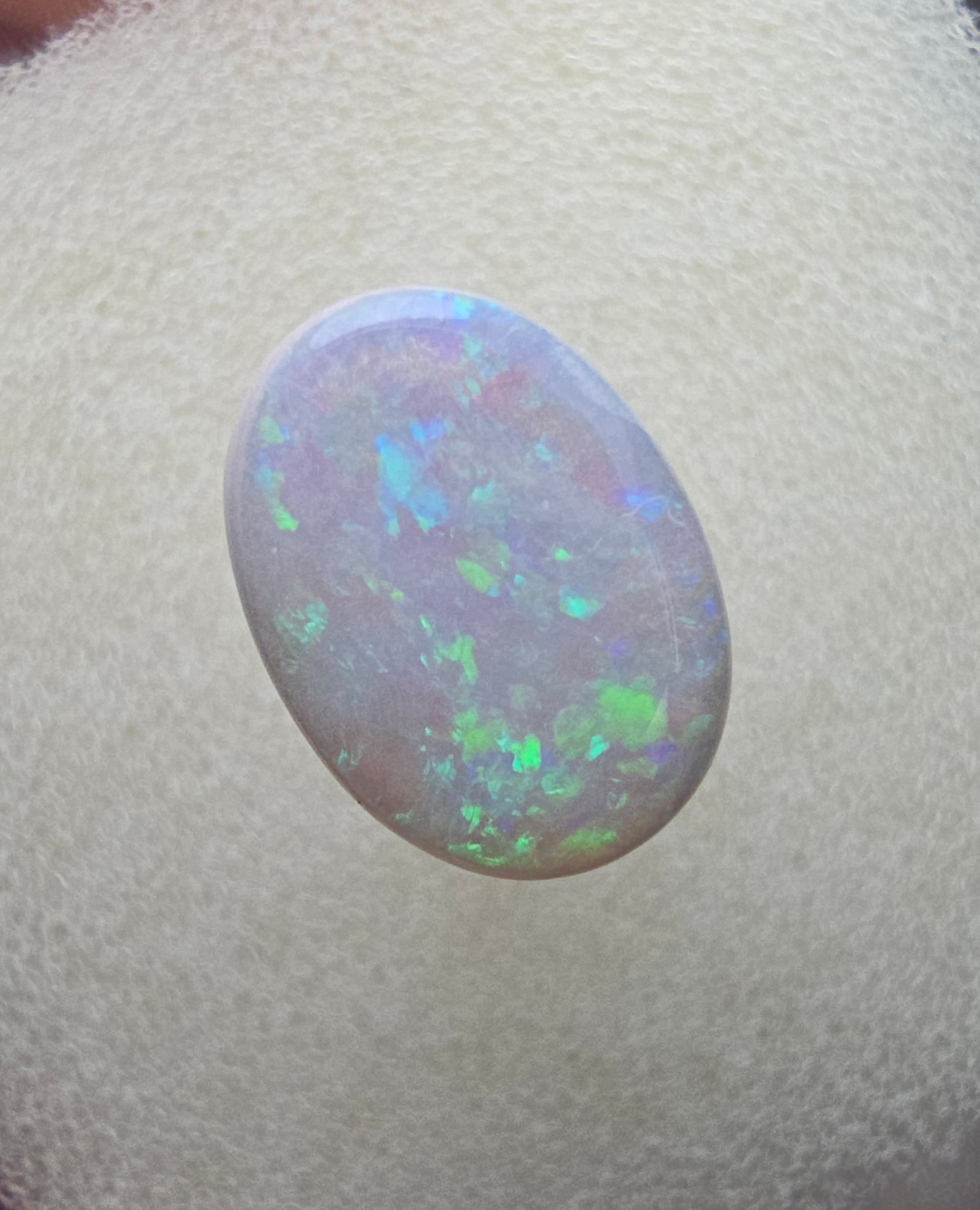 A111 - Oval cut white opal