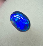 A695 - Fascinatingly bright black opal