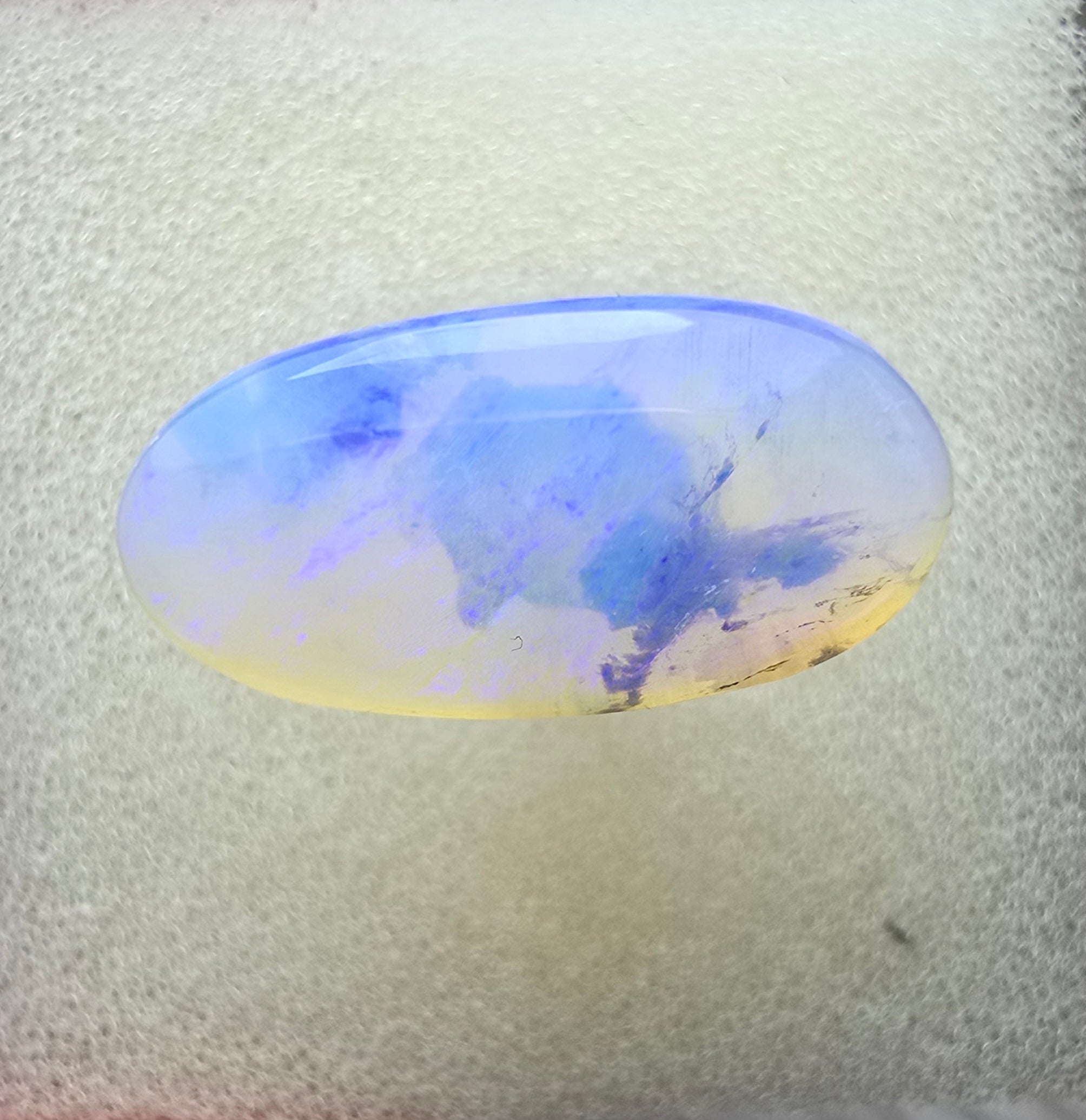 A714 - Large oval cut purple crystal