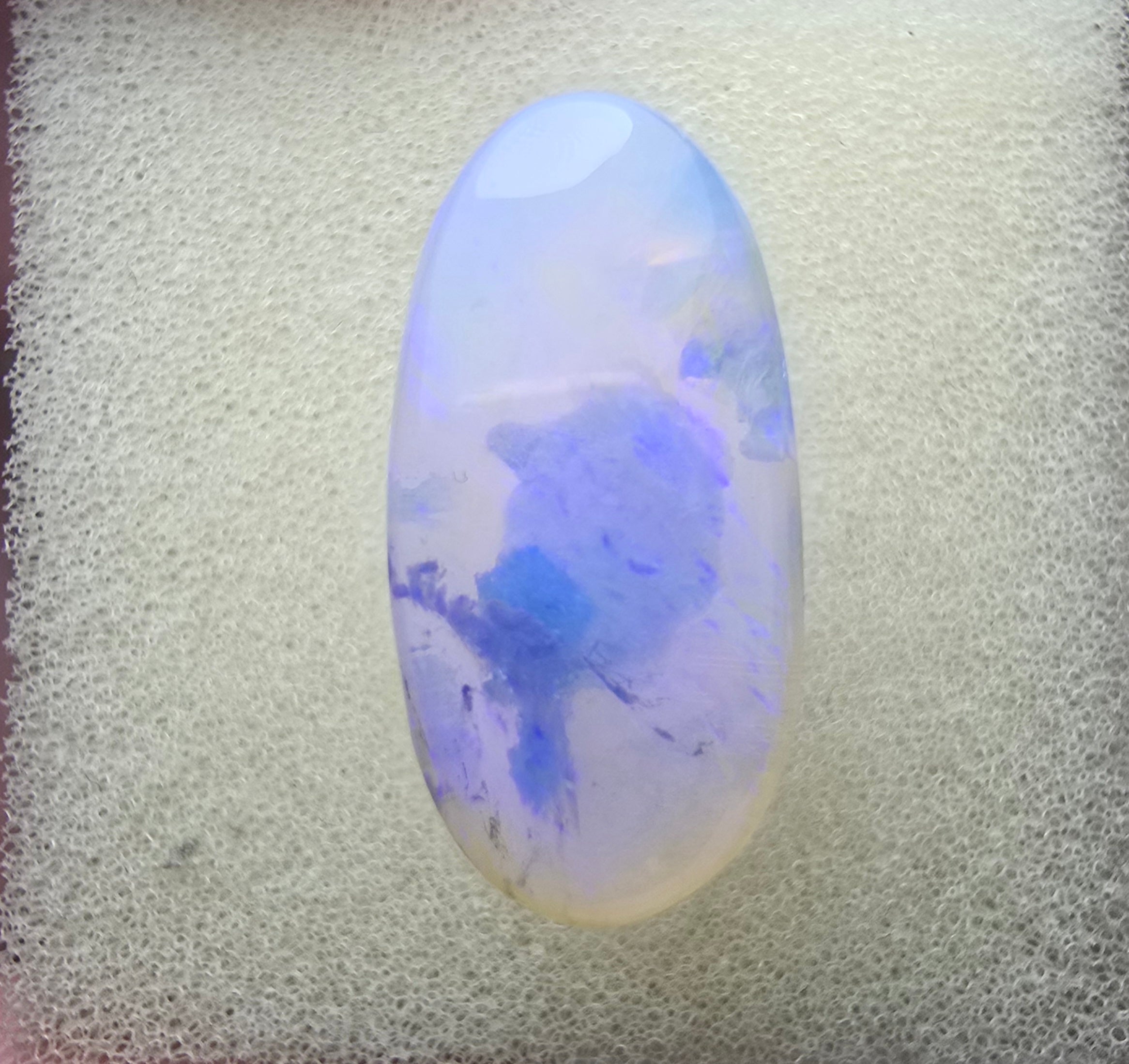 A714 - Large oval cut purple crystal