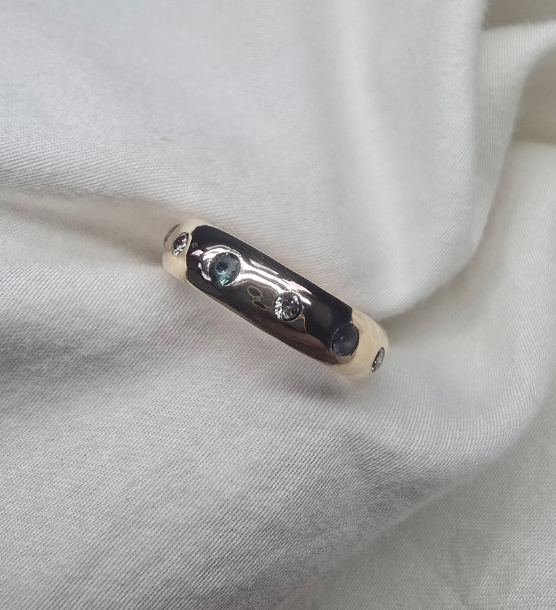 J010 - Gold Sapphire and diamond band.