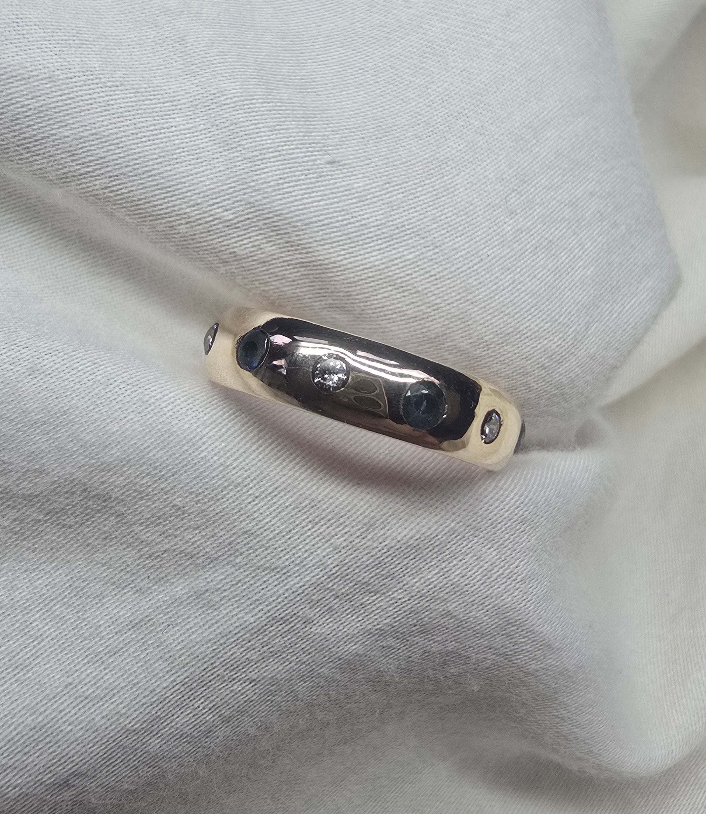 J010 - Gold Sapphire and diamond band.