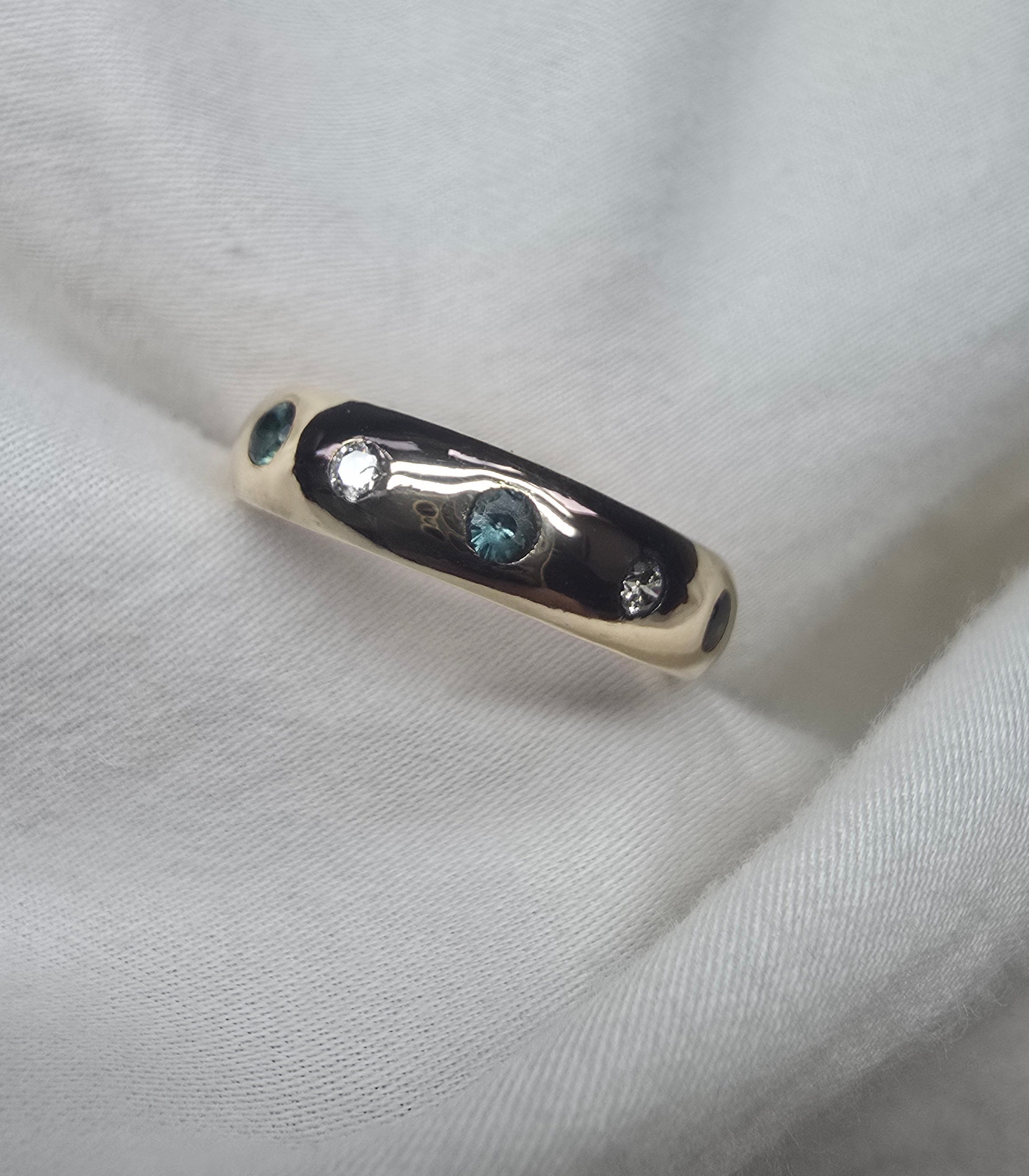 J010 - Gold Sapphire and diamond band.