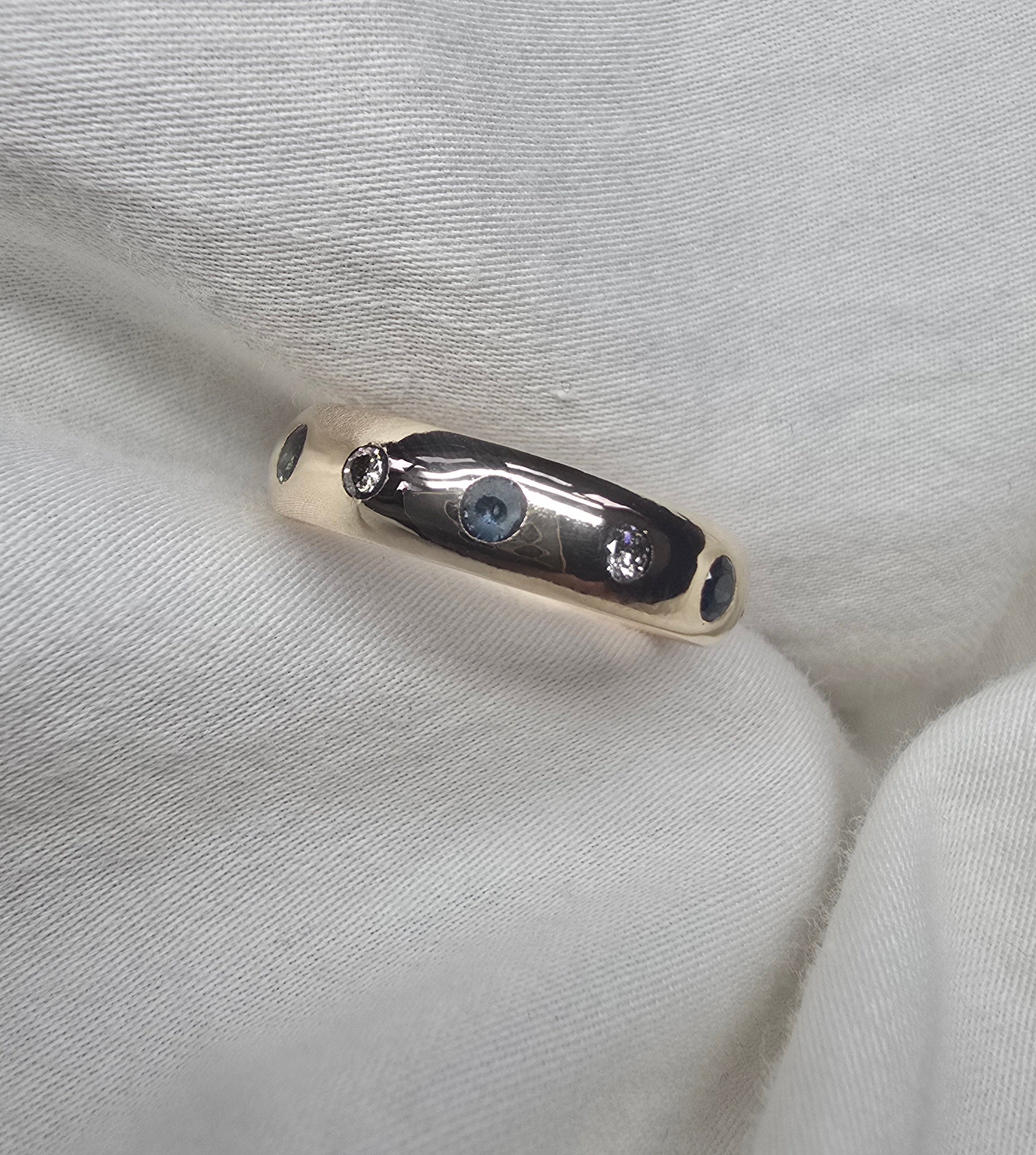 J010 - Gold Sapphire and diamond band.