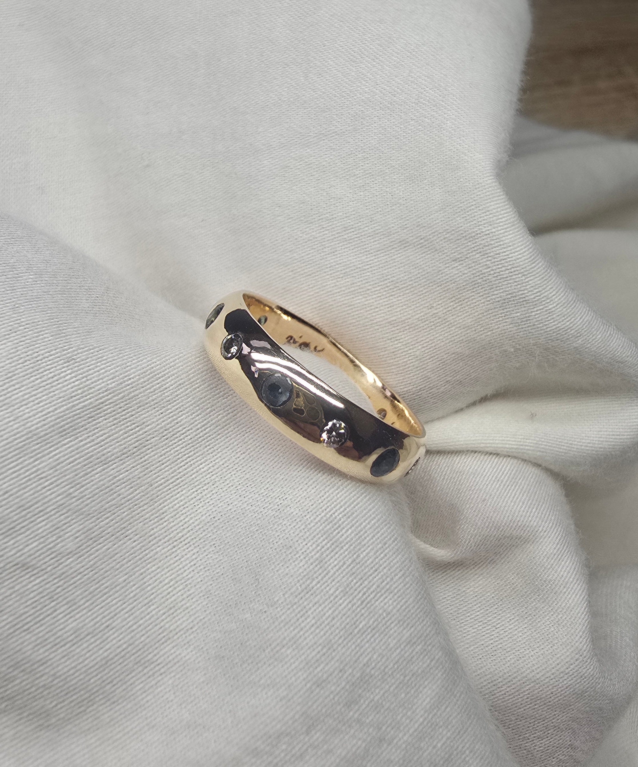 J010 - Gold Sapphire and diamond band.