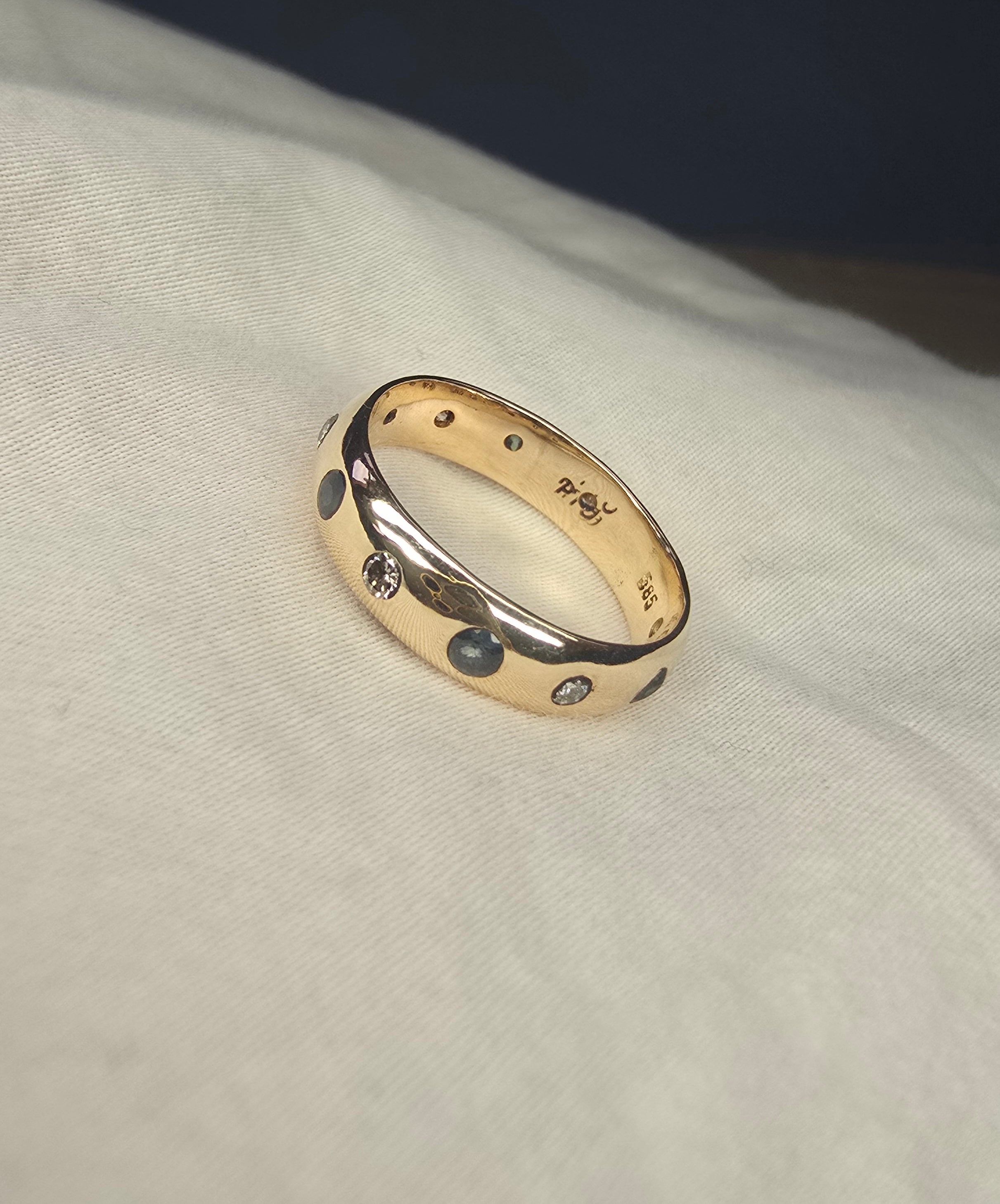 J010 - Gold Sapphire and diamond band.