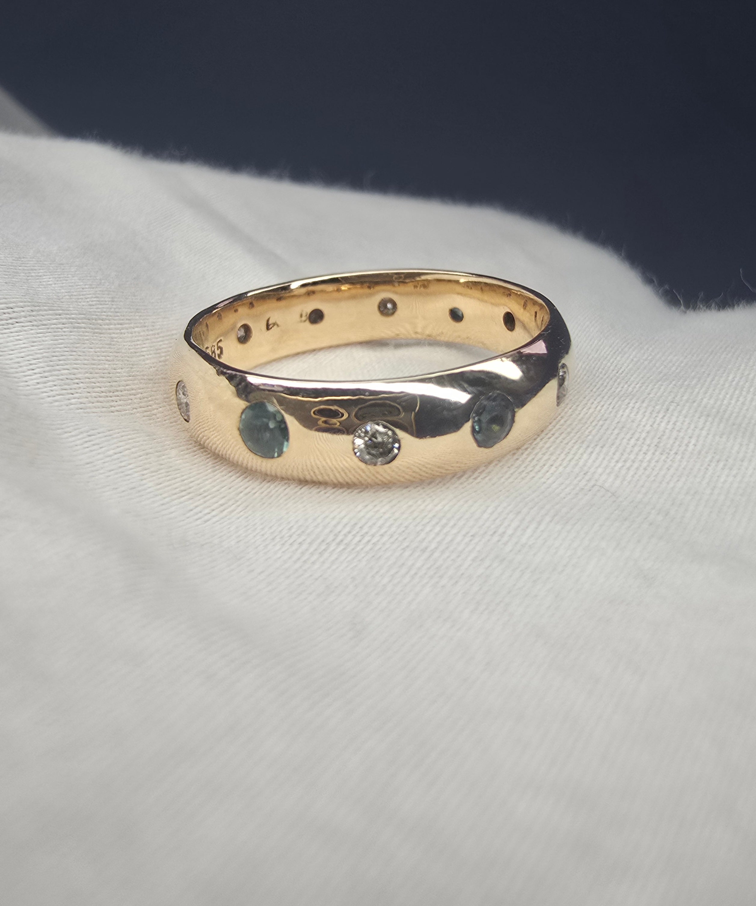 J010 - Gold Sapphire and diamond band.