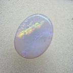 A747 - Broad face picture stone oval cut.
