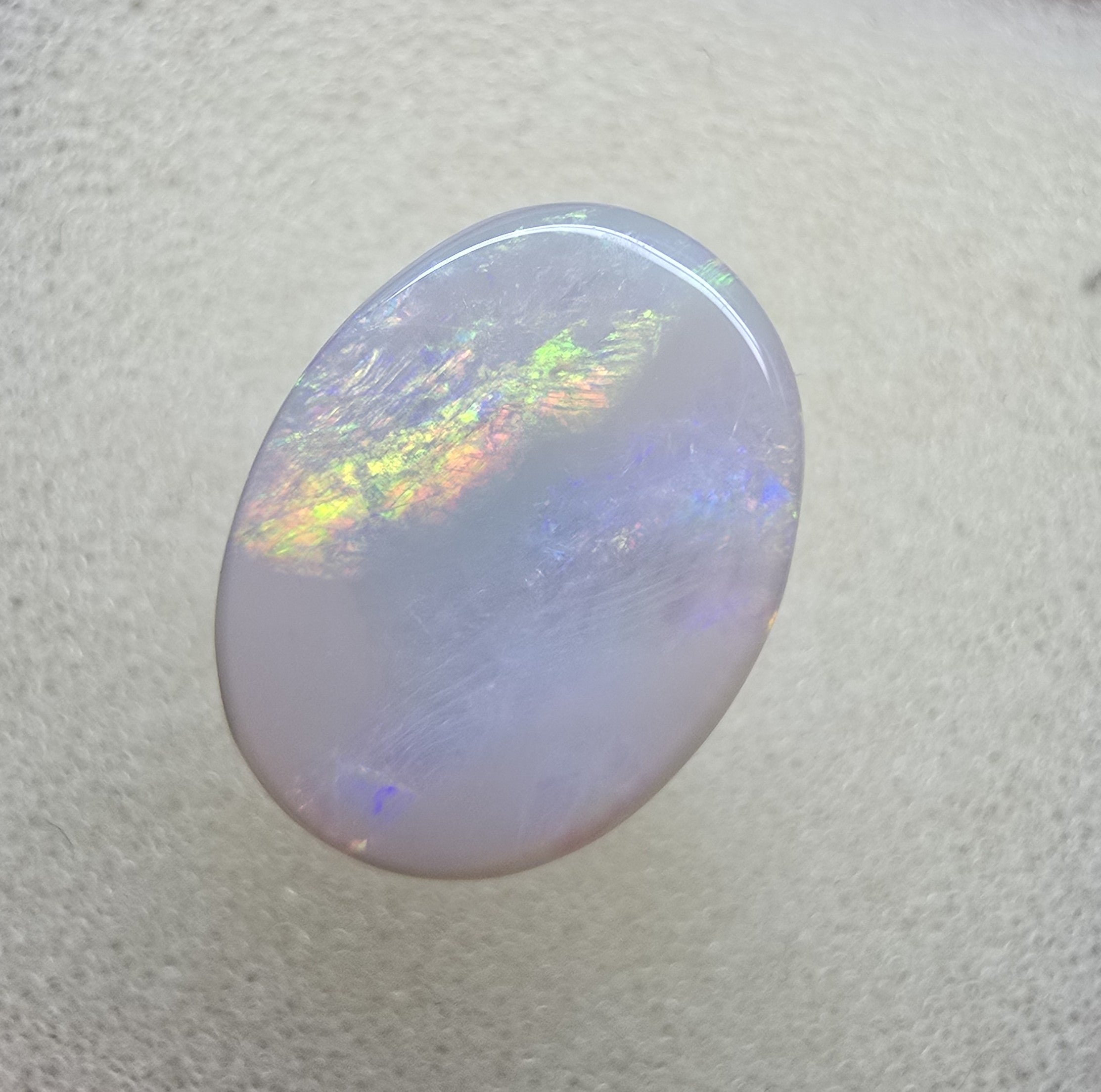 A747 - Broad face picture stone oval cut.