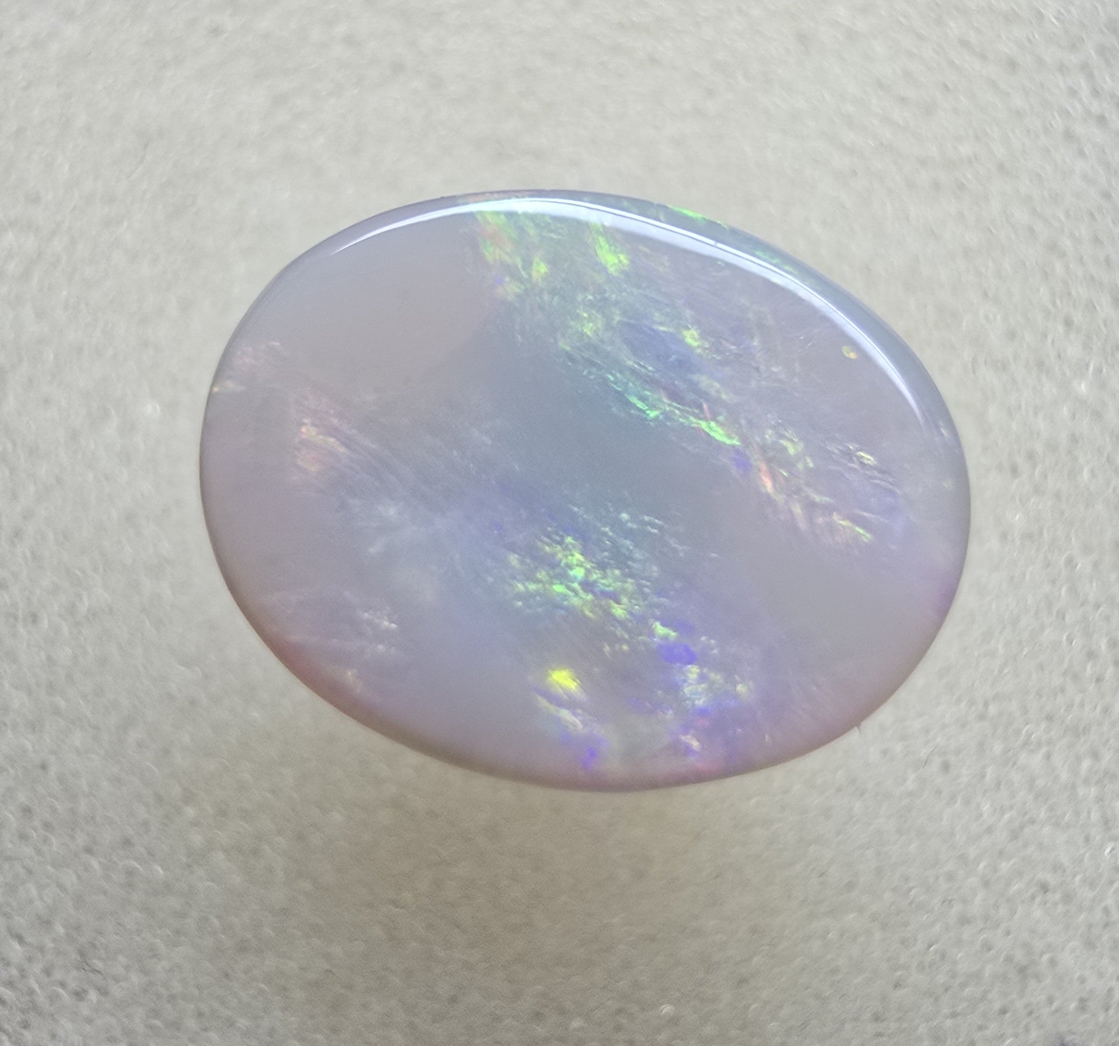 A747 - Broad face picture stone oval cut.