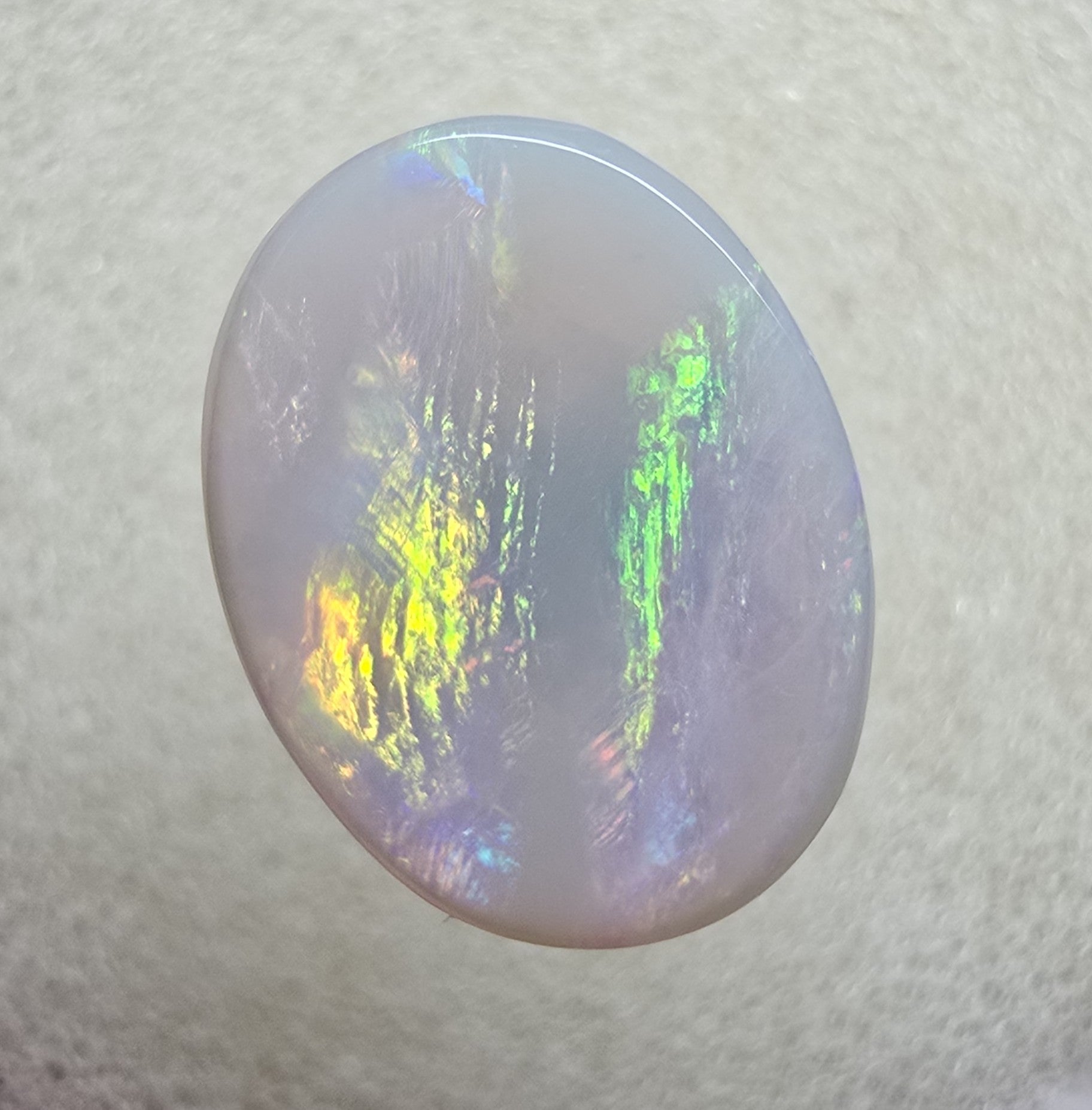 A747 - Broad face picture stone oval cut.