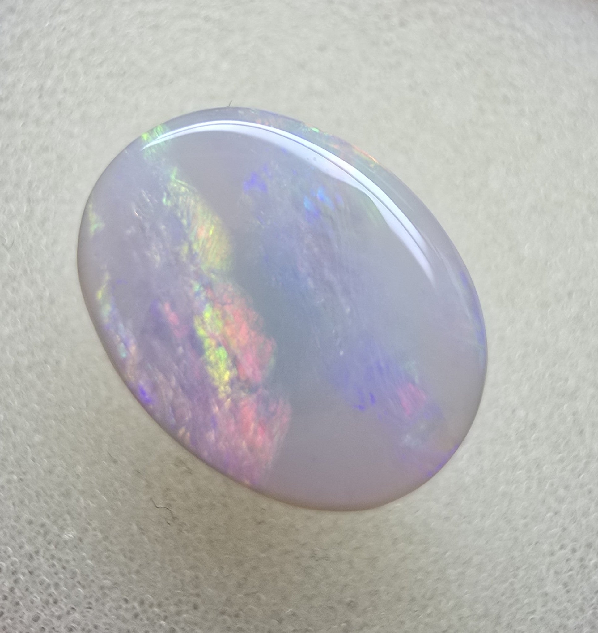 A747 - Broad face picture stone oval cut.
