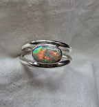J011 - Bright multicoloured dark opal ring