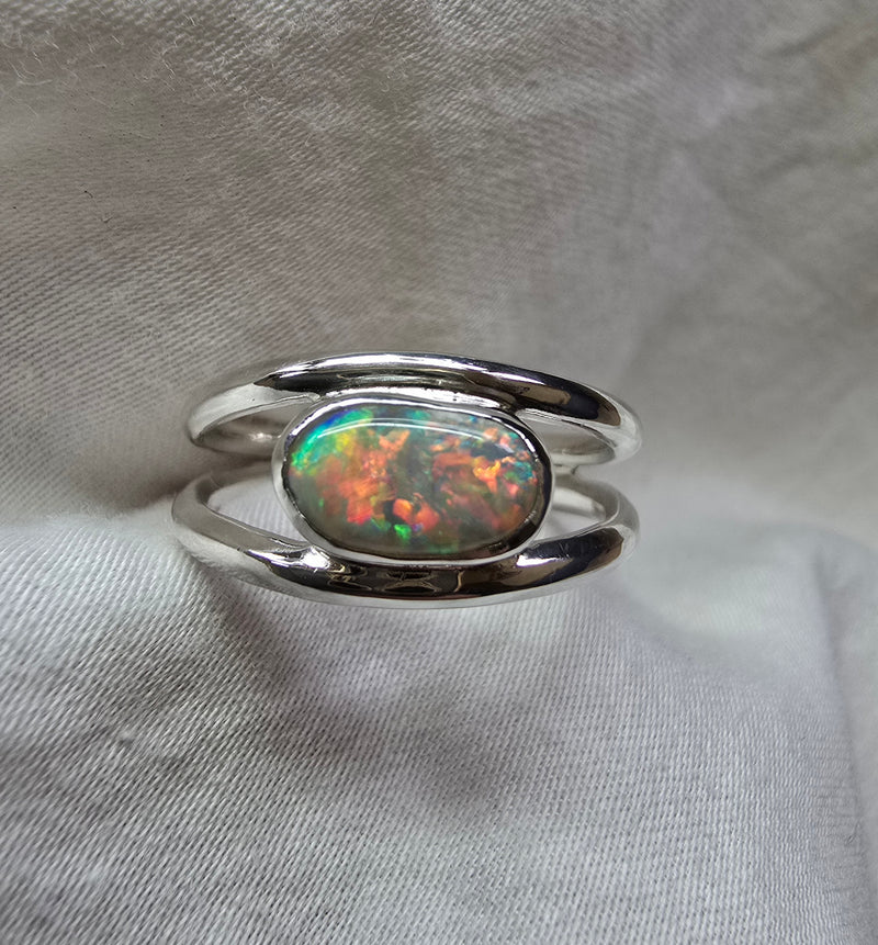 J011 - Bright multicoloured dark opal ring
