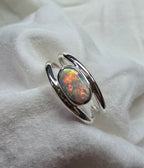 J011 - Bright multicoloured dark opal ring