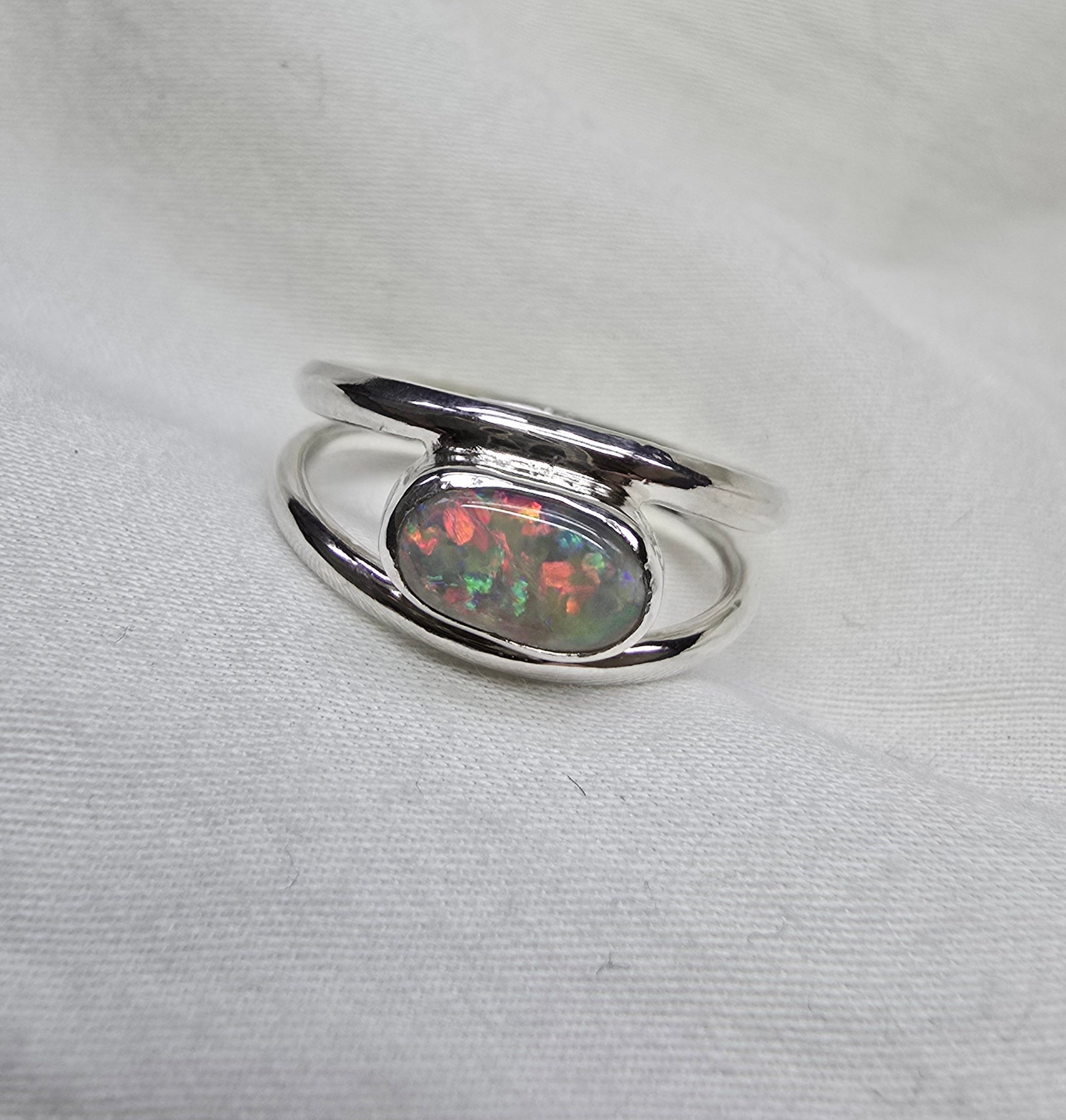 J011 - Bright multicoloured dark opal ring