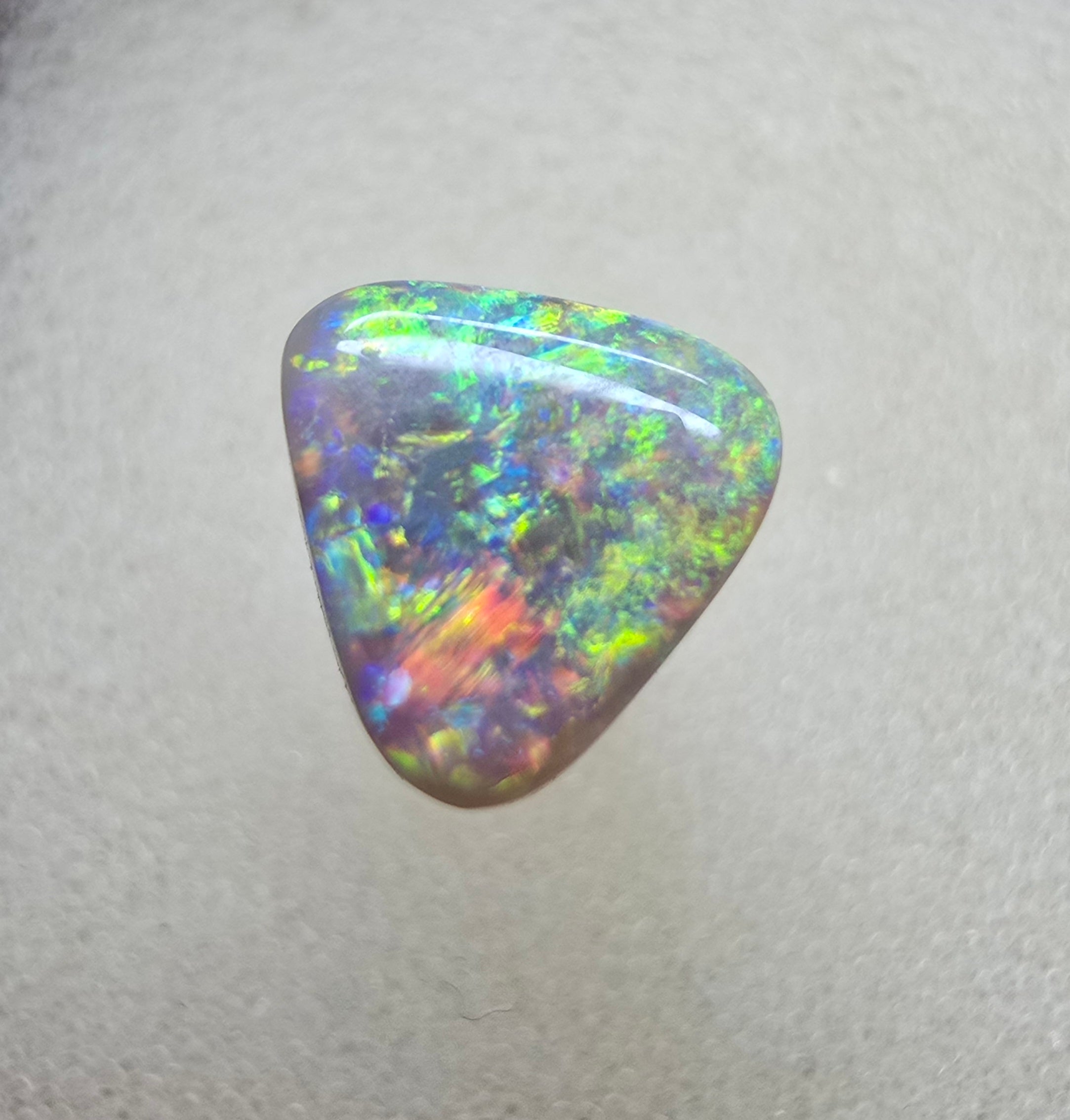 A771 - Bright and brilliant gem, triangle cut