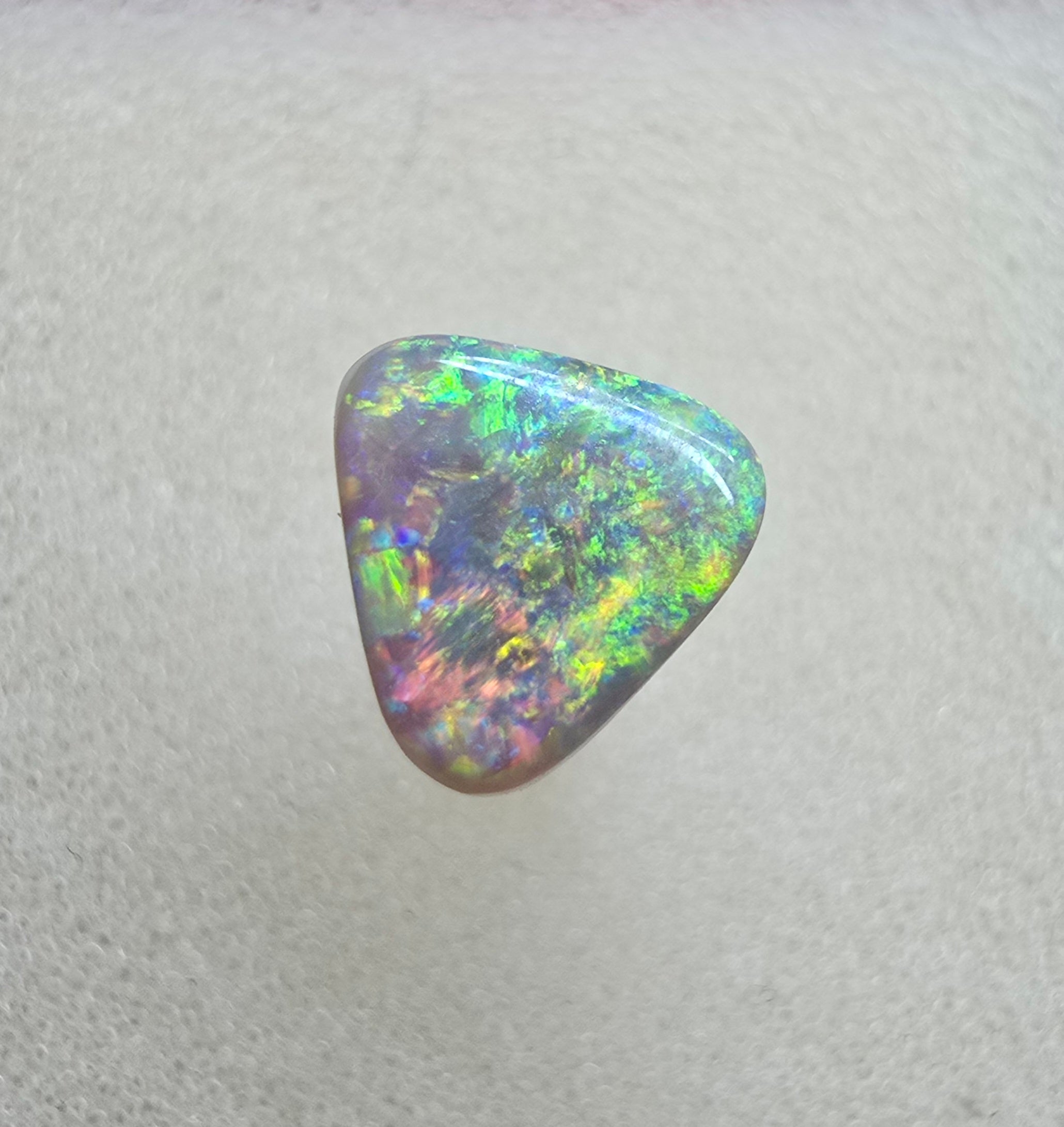 A771 - Bright and brilliant gem, triangle cut