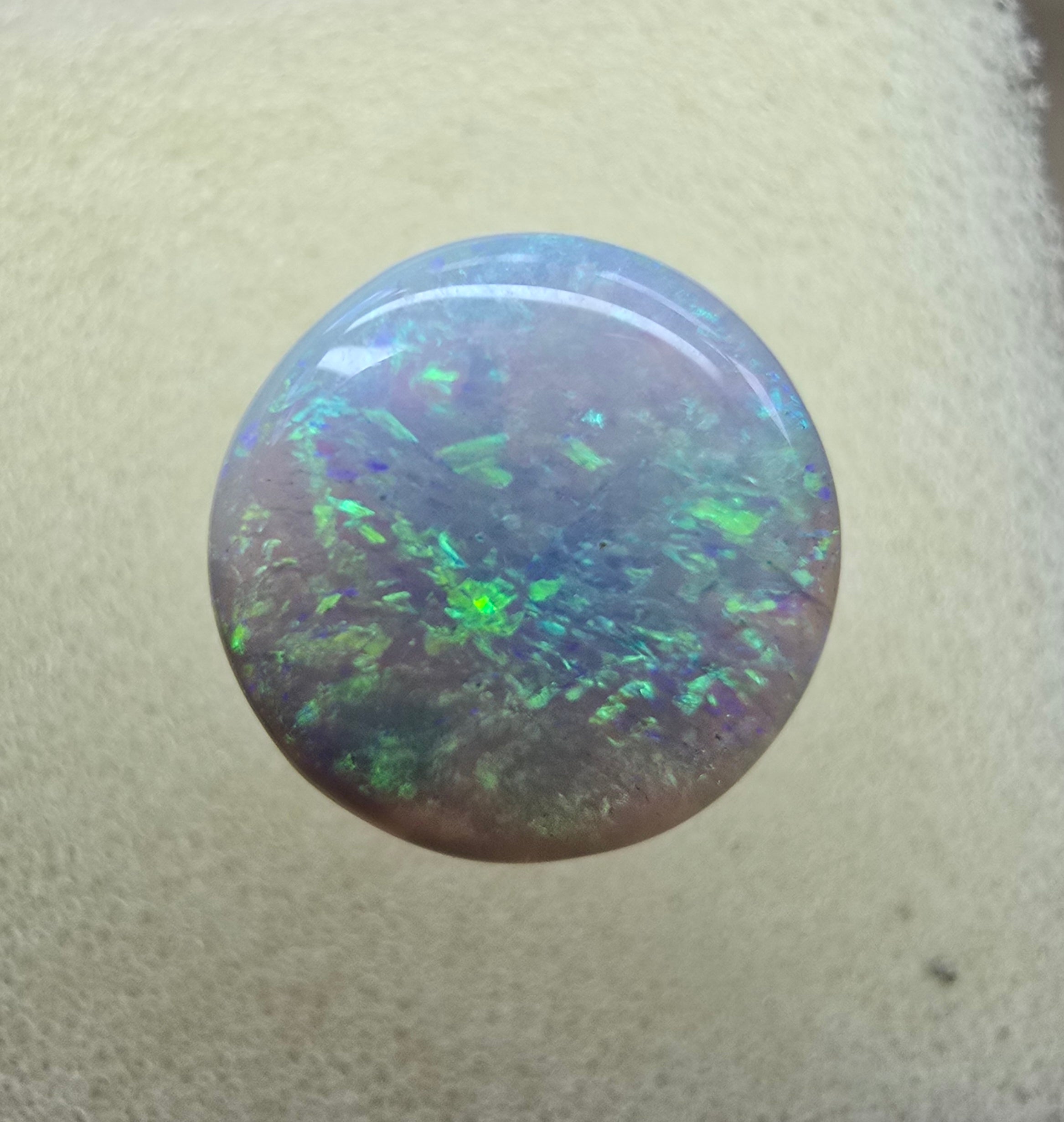 A222 - Stunning circle cut dark opal