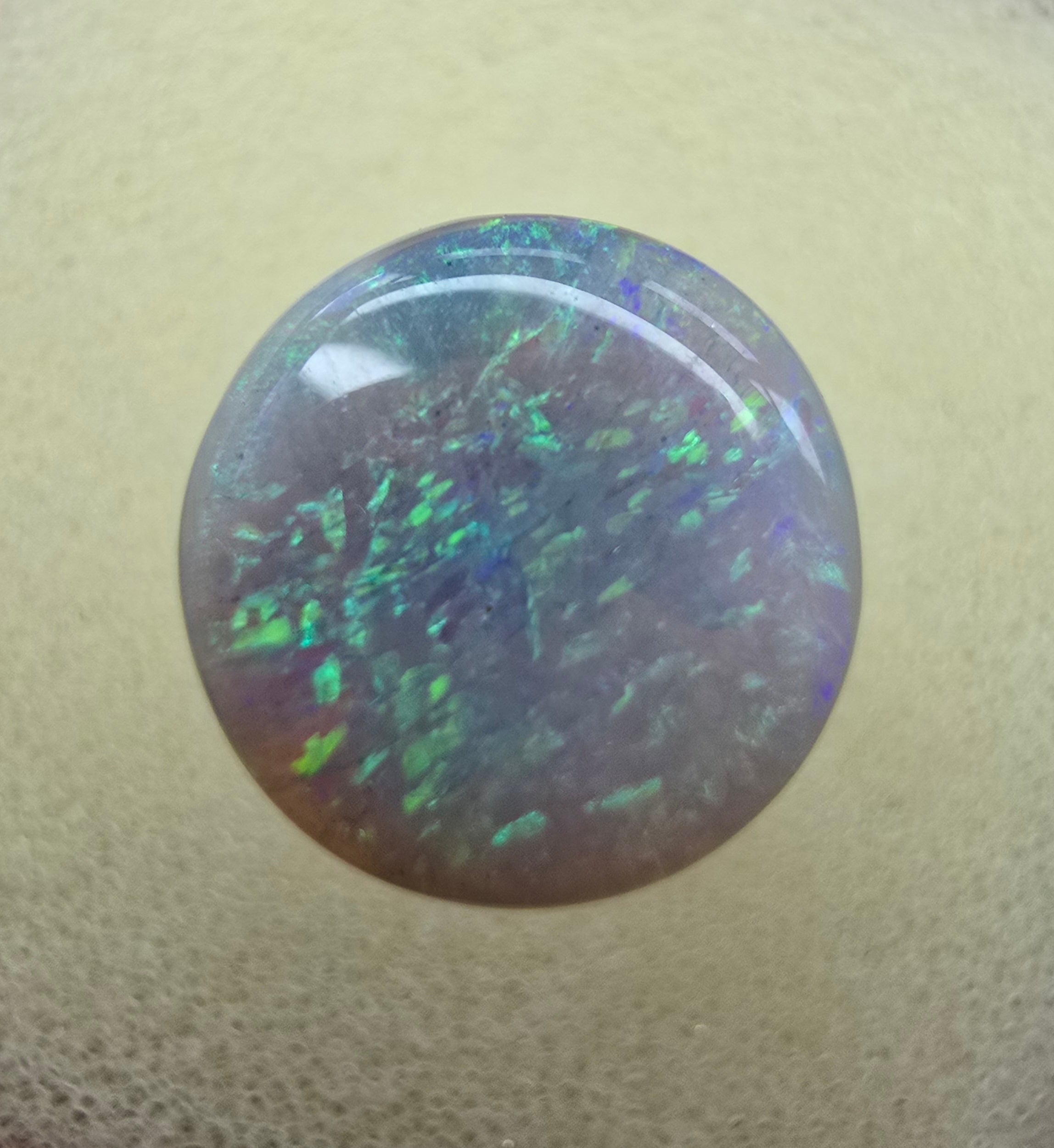 A222 - Stunning circle cut dark opal