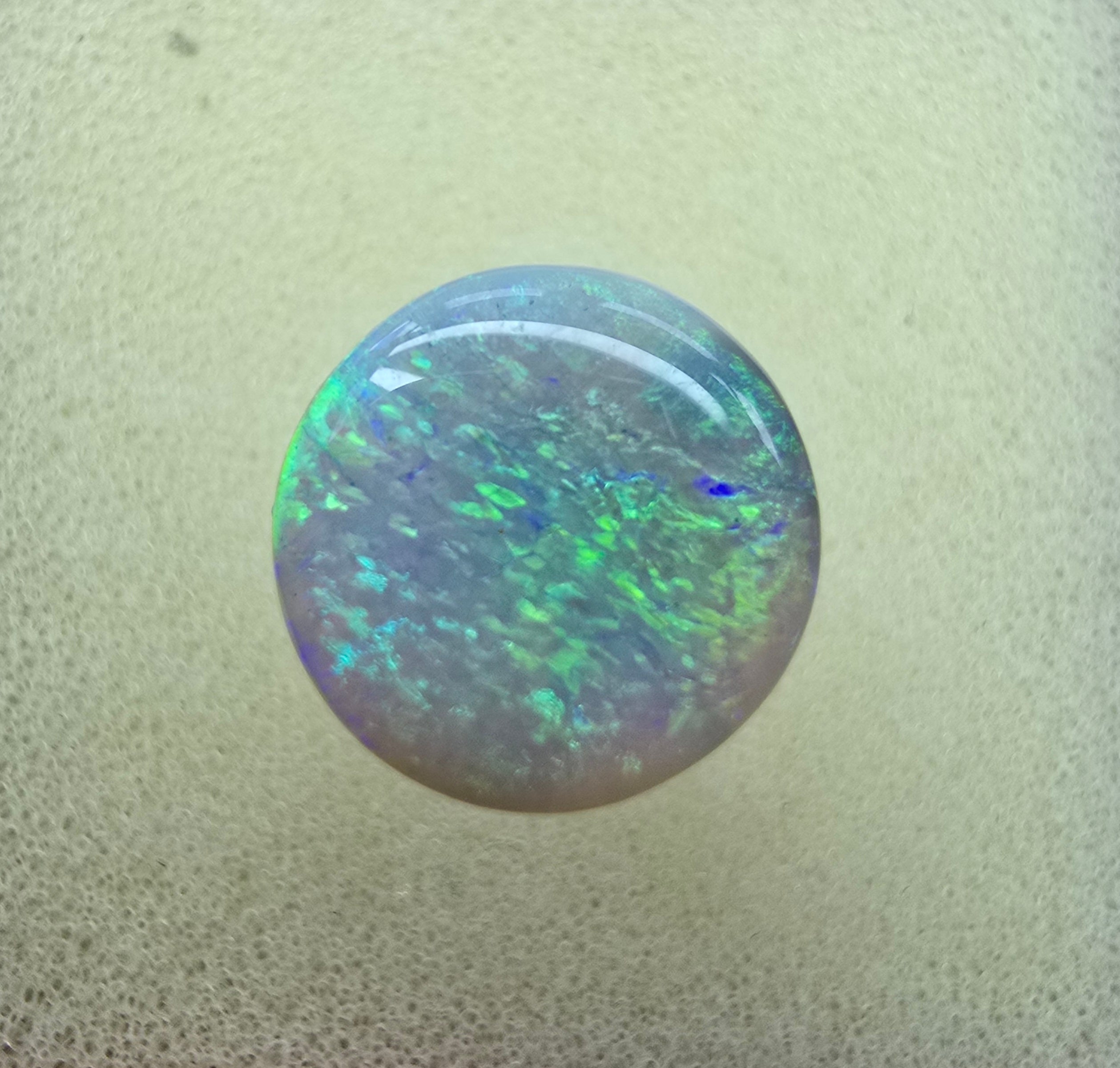 A222 - Stunning circle cut dark opal