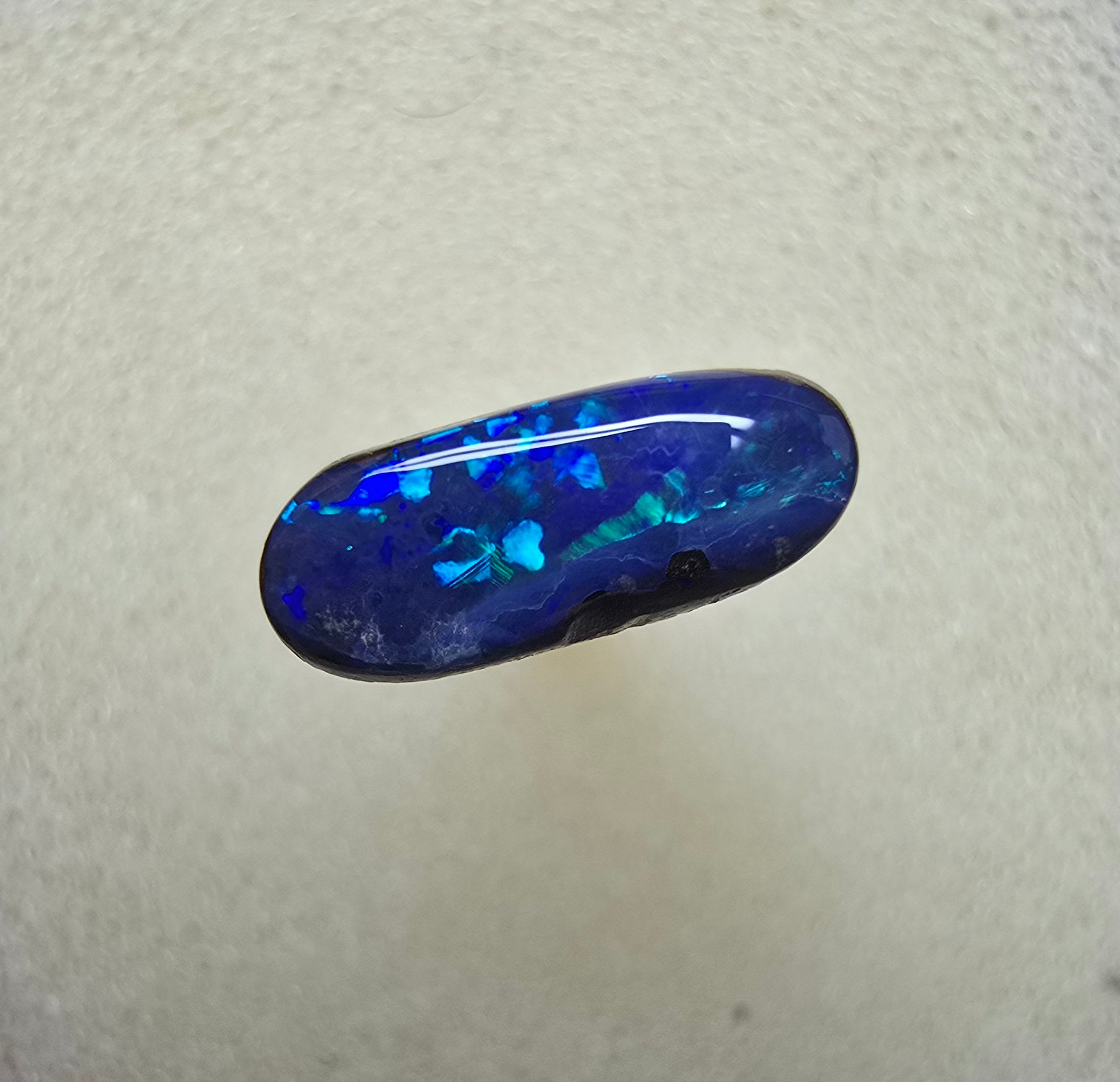 A812 - Long oval cut bright blue