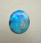 A821 - Bold round cut boulder opal