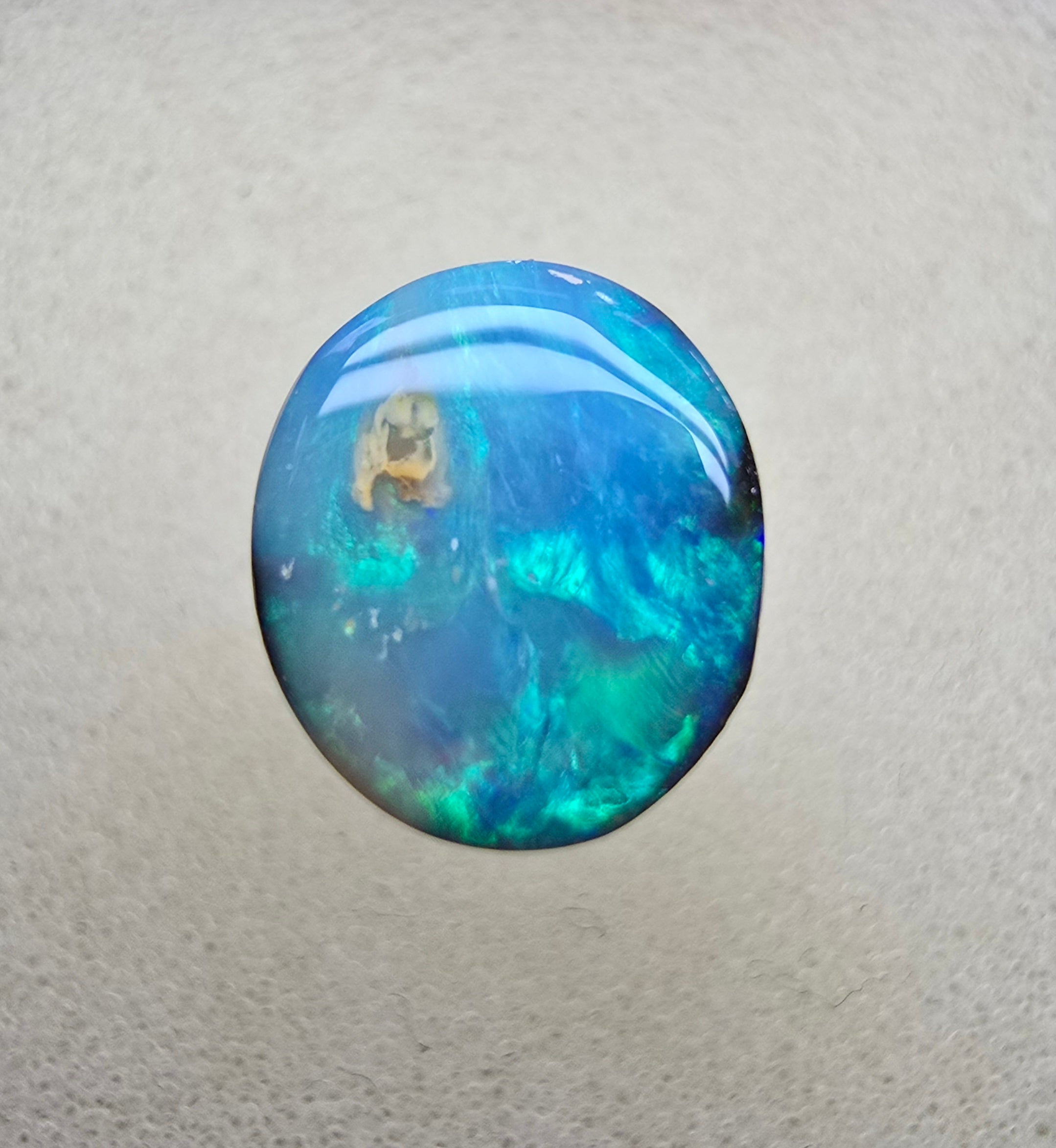A821 - Bold round cut boulder opal
