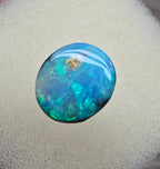 A821 - Bold round cut boulder opal