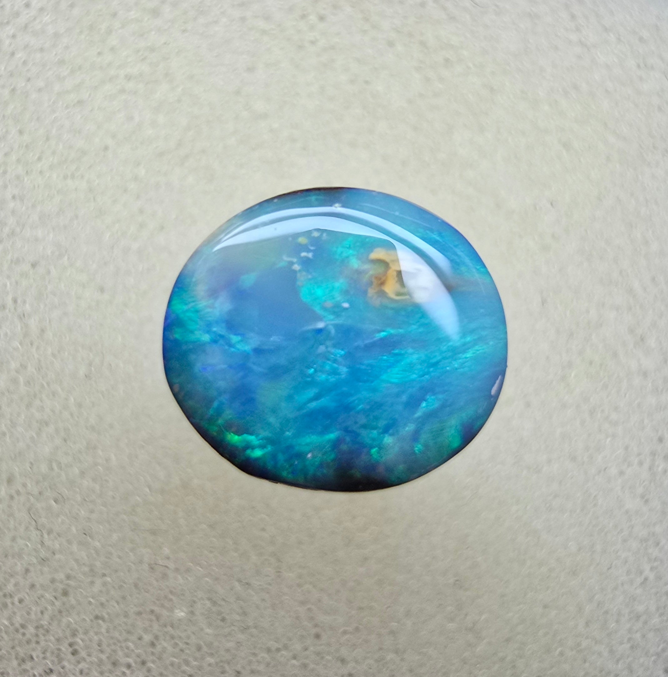 A821 - Bold round cut boulder opal