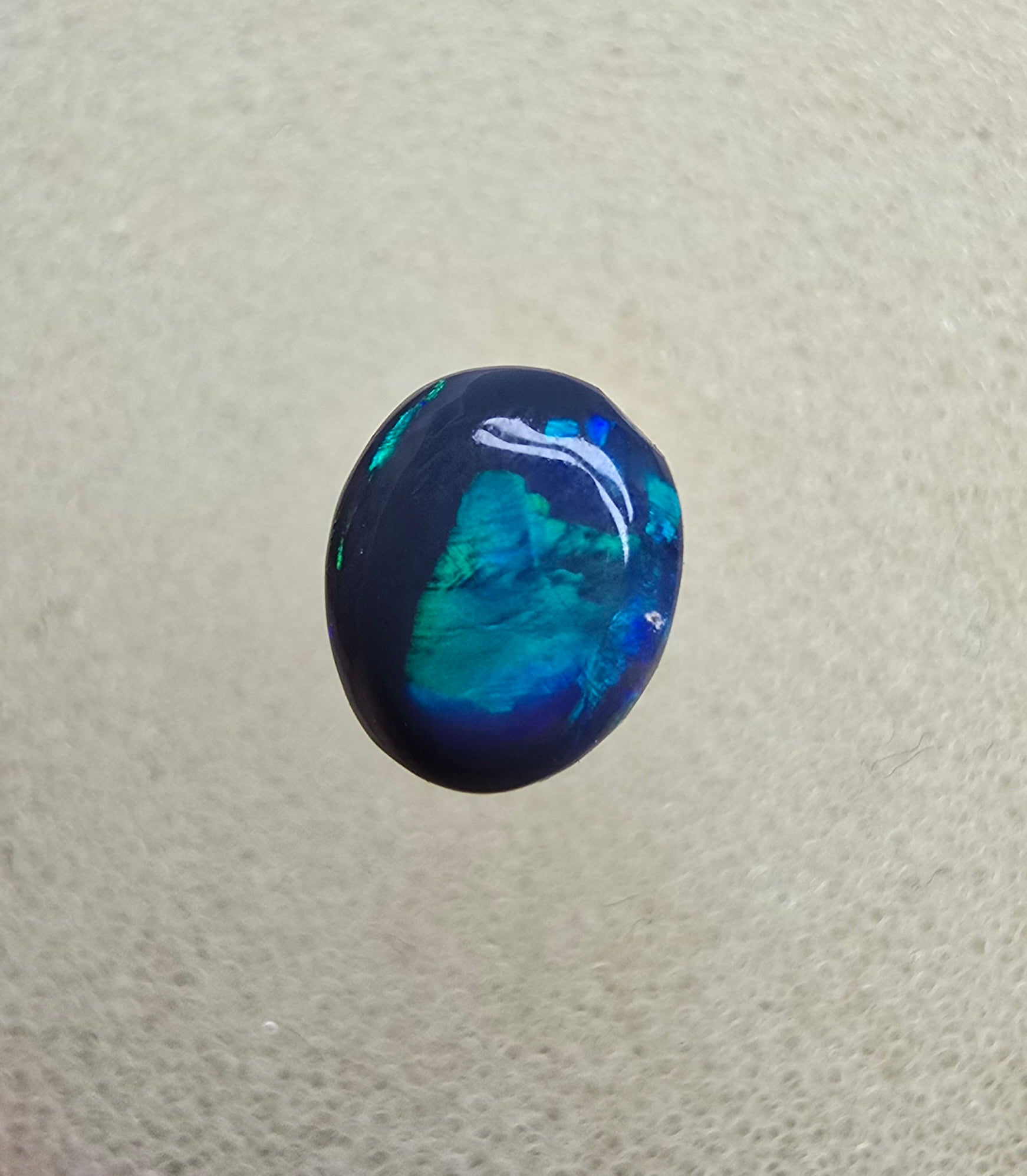 A826 - Small cab blue on black opal