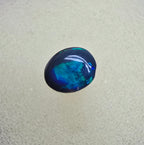 A826 - Small cab blue on black opal