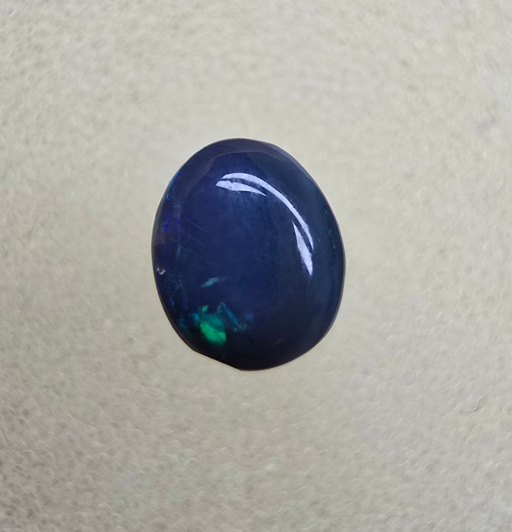 A826 - Small cab blue on black opal