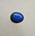 A826 - Small cab blue on black opal