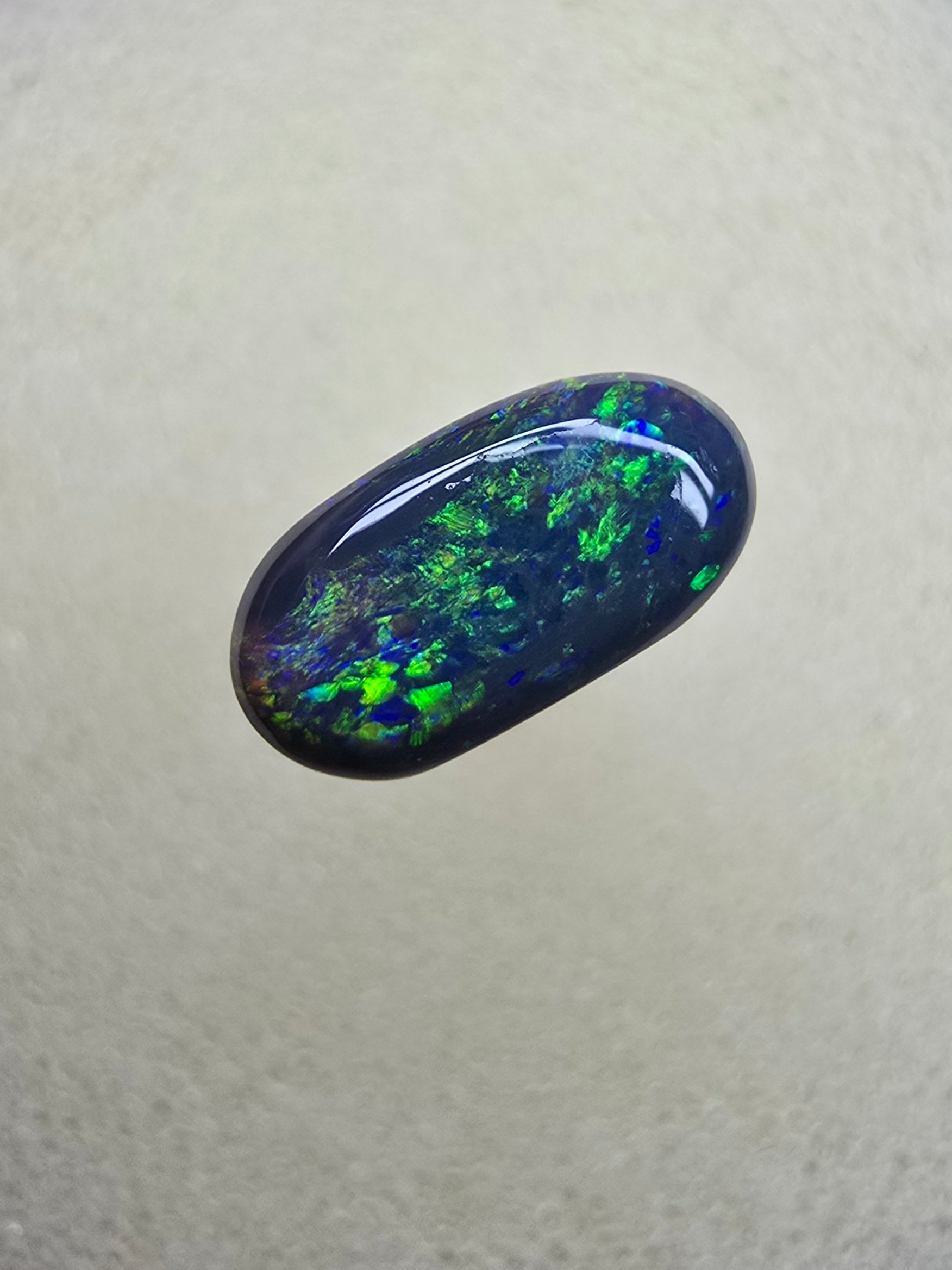 A839 - Oval cut black opal beauty
