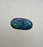 A839 - Oval cut black opal beauty